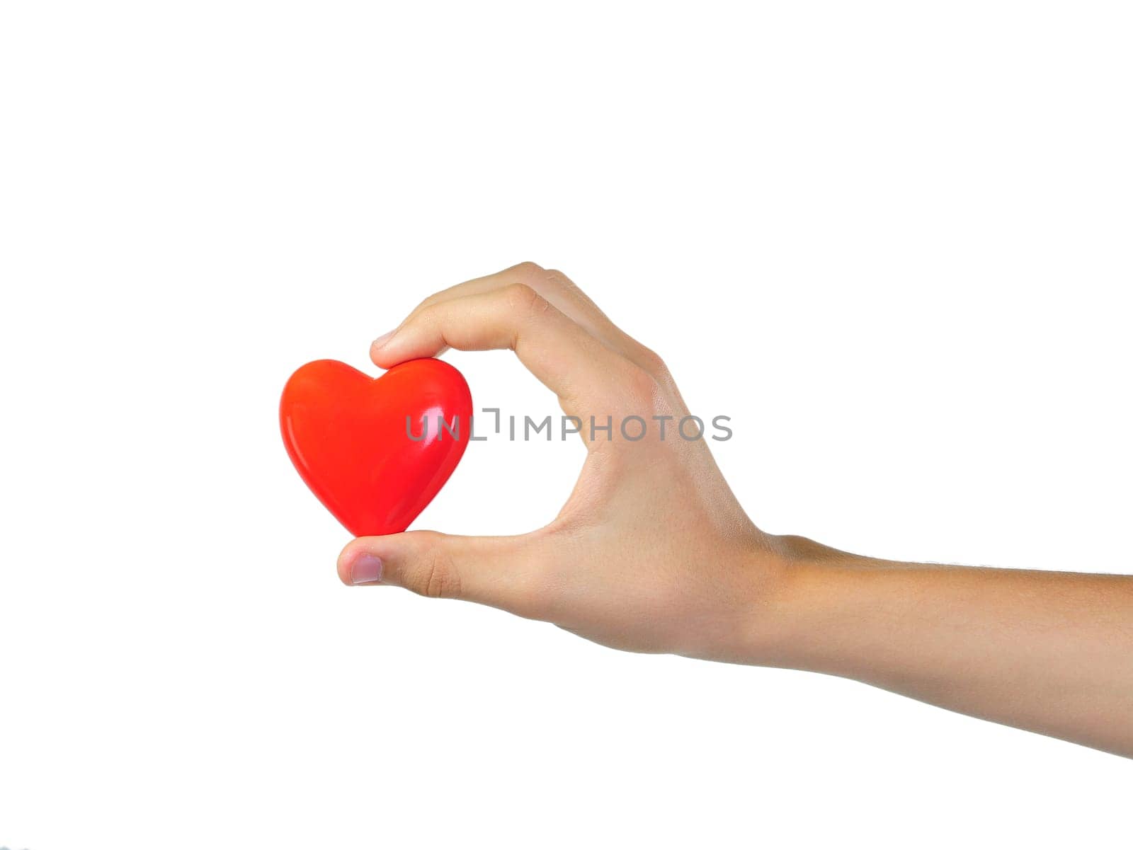 Hand holds heart