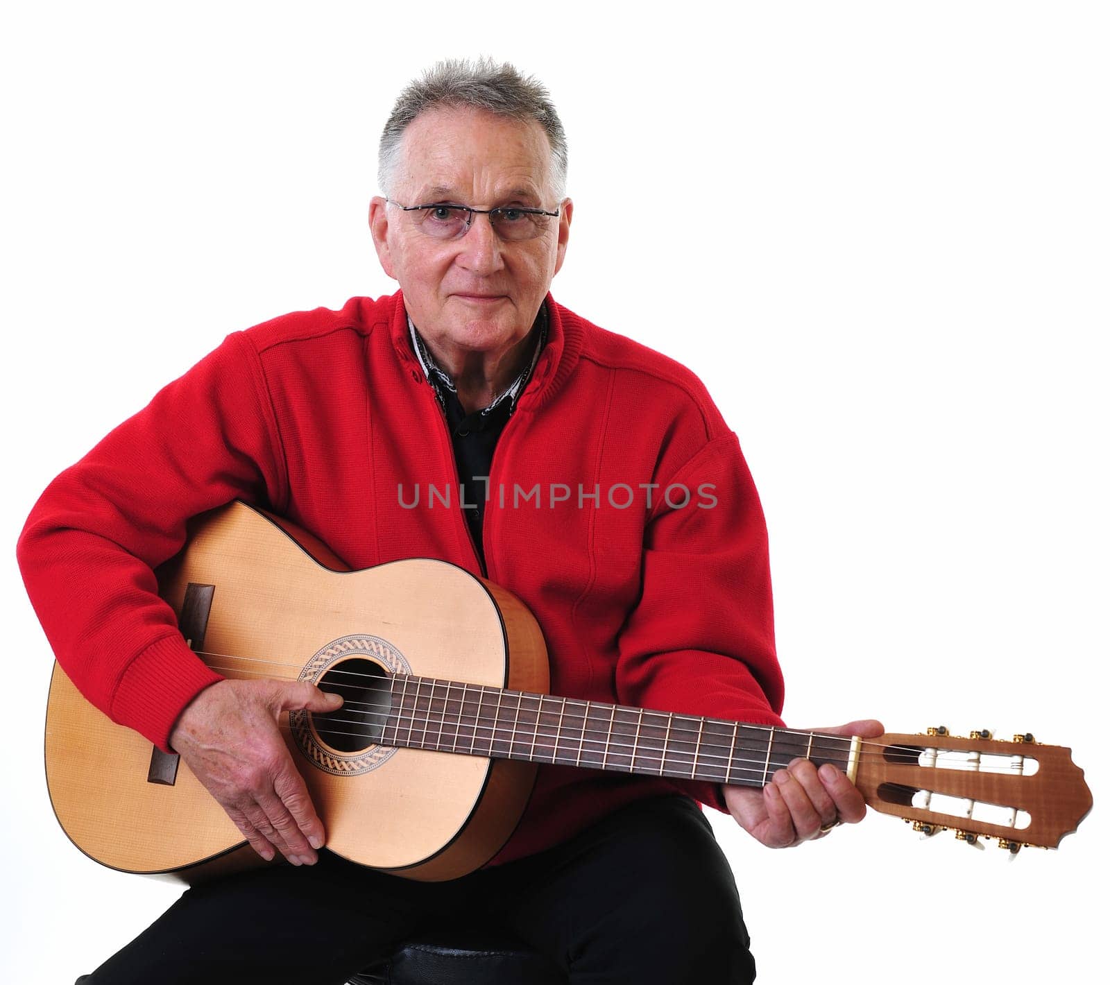 Retired pensioner plays guitar
