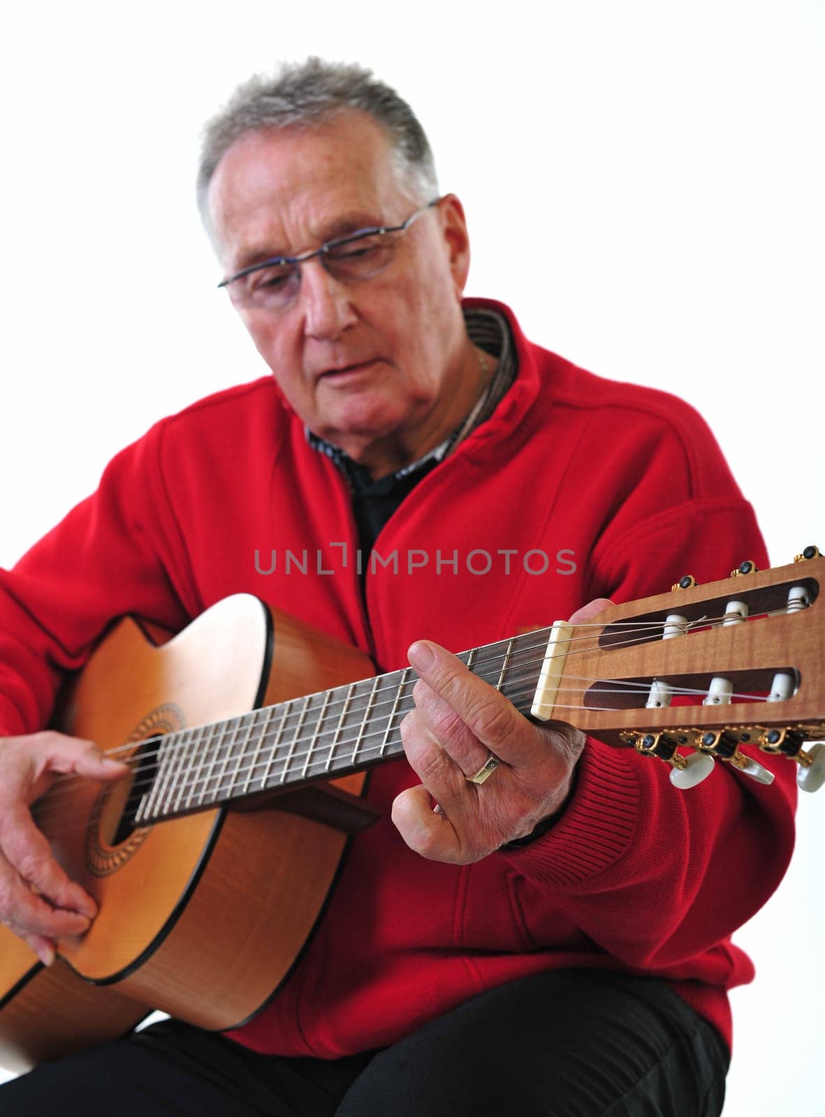 Retired pensioner plays guitar