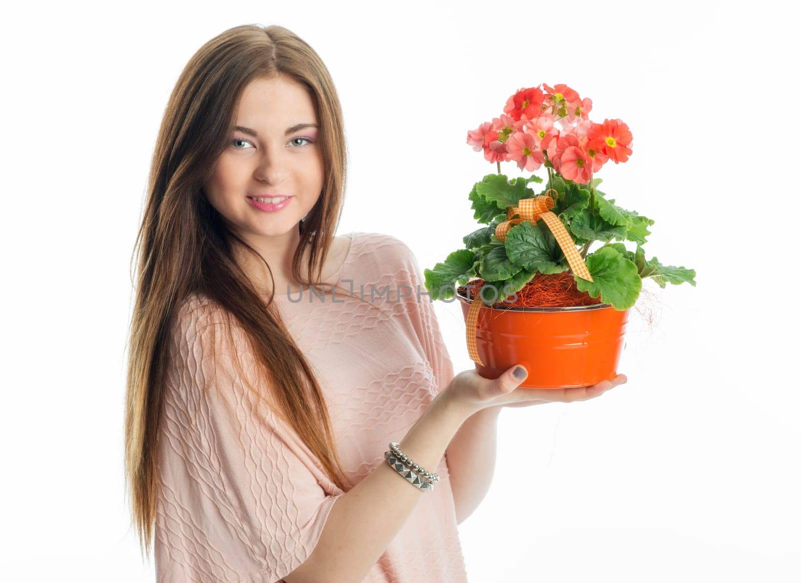 Young girl with potted plant
