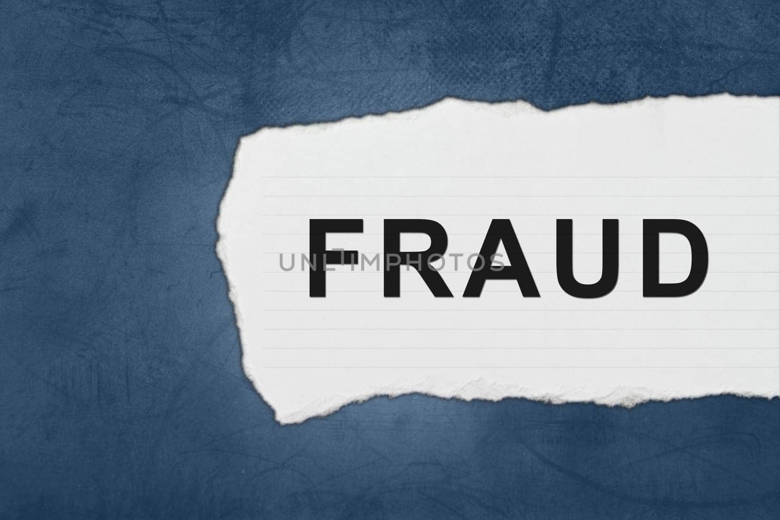 fraud with white paper tears on blue texture