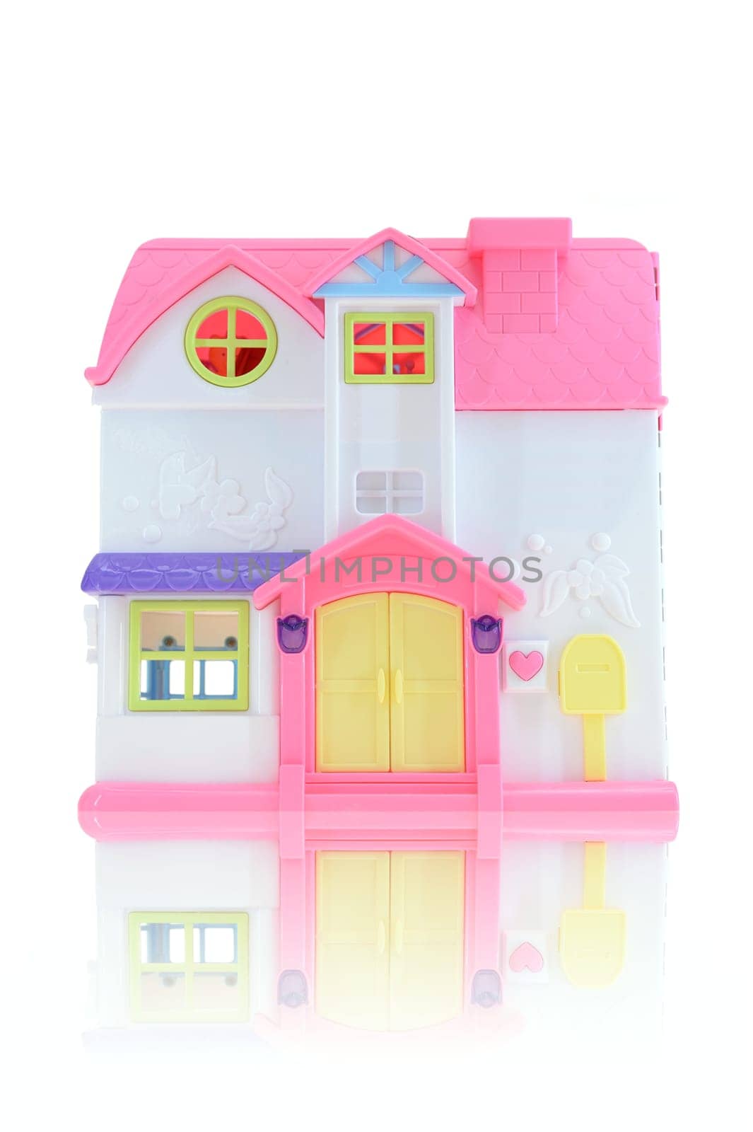 A close up shot of a toy doll house