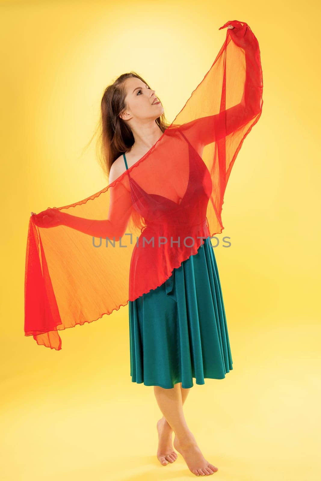 A beautiful woman over a plain background.