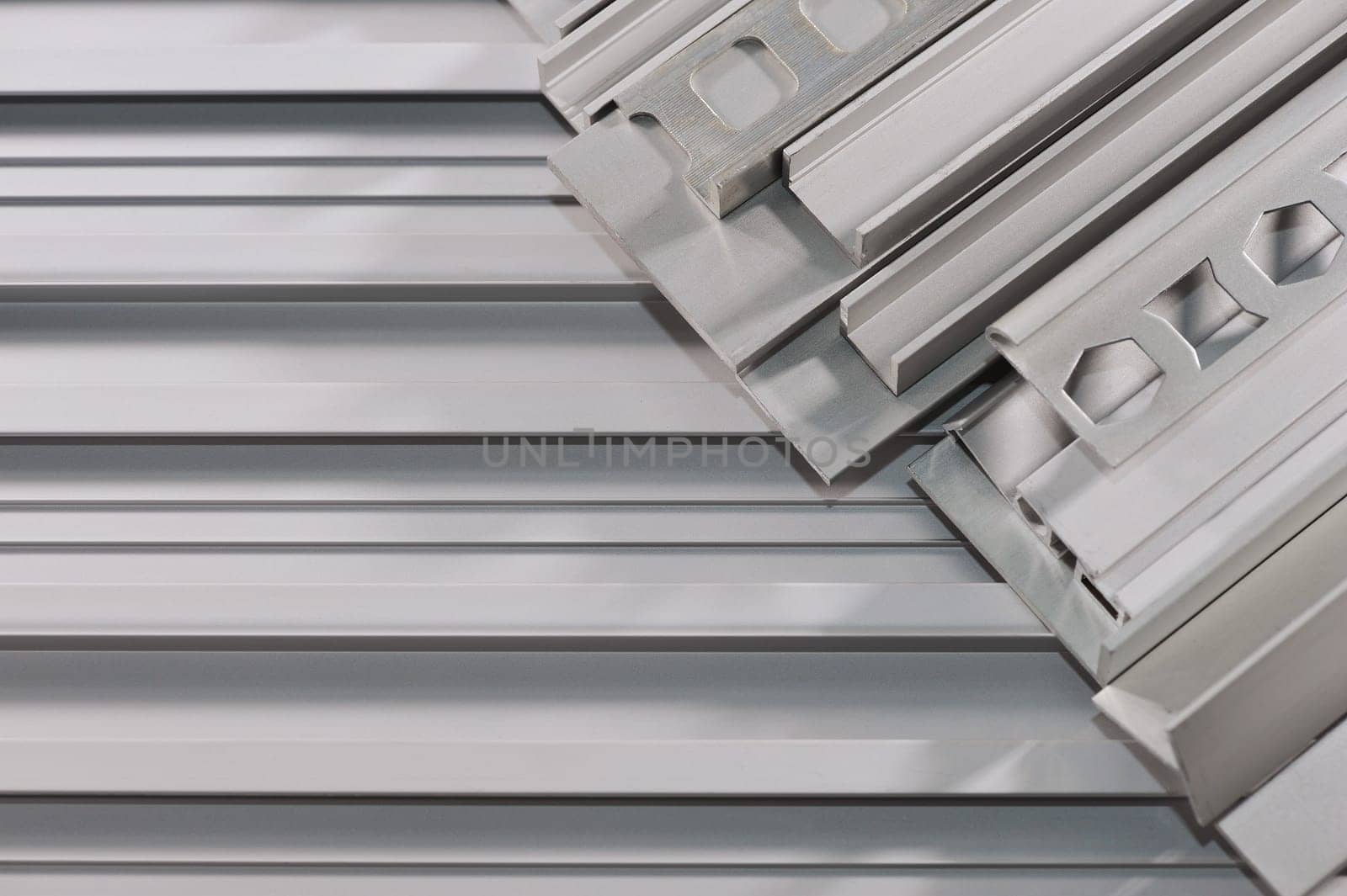 many different aluminium profile strips in the spotlight