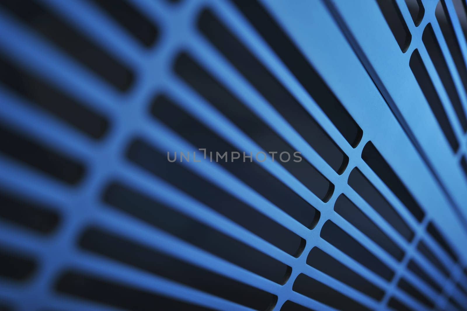 abstract industrial background made of aluminium ventilation grilles