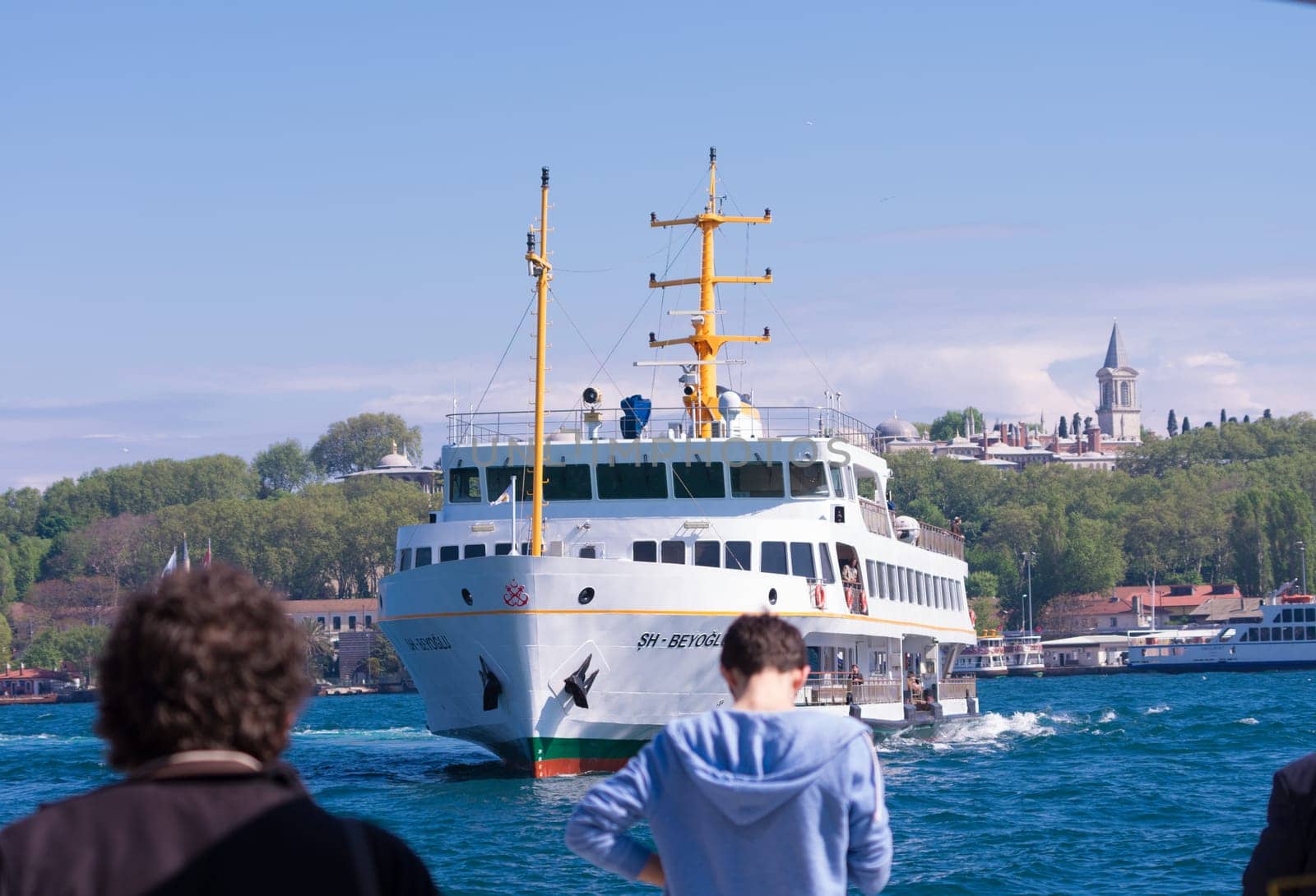 Ferry boat arriving at Karakoy pier in Istanbul. Nearly 150,000 passengers use ferries daily in Istanbul, due to easy access to two different continents.