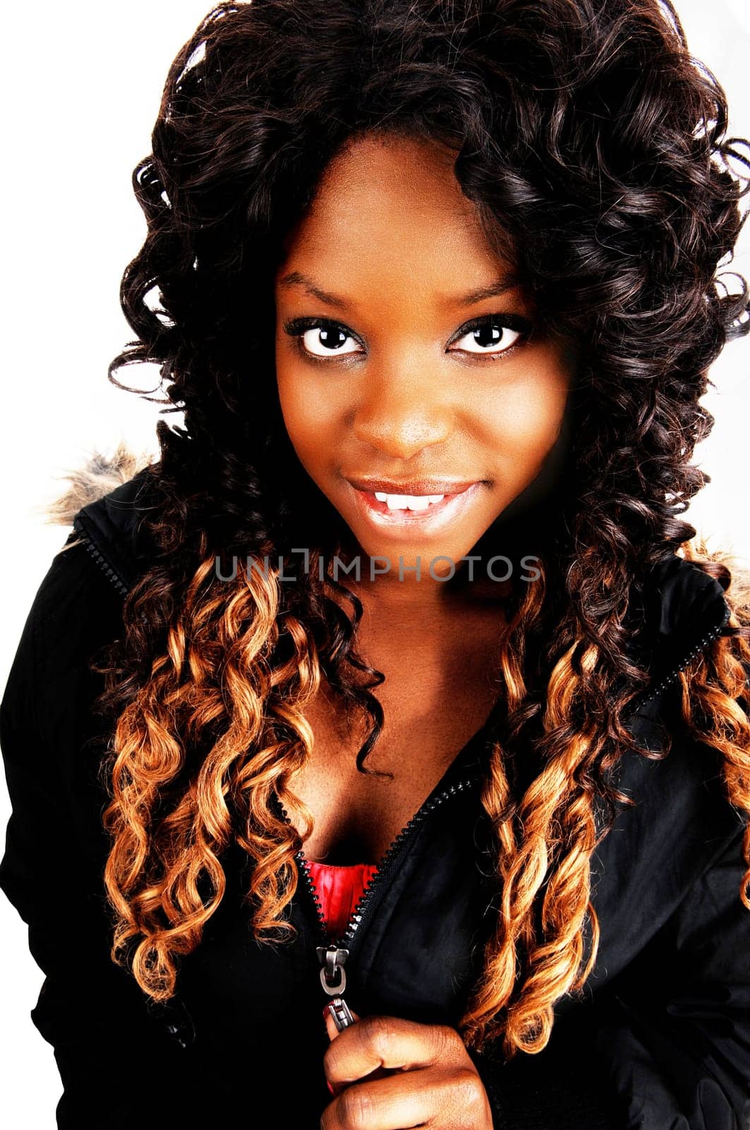 A closeup portrait picture of a beautiful Jamaican woman with long brown.hair wearing a black jacket, isolated for white background..