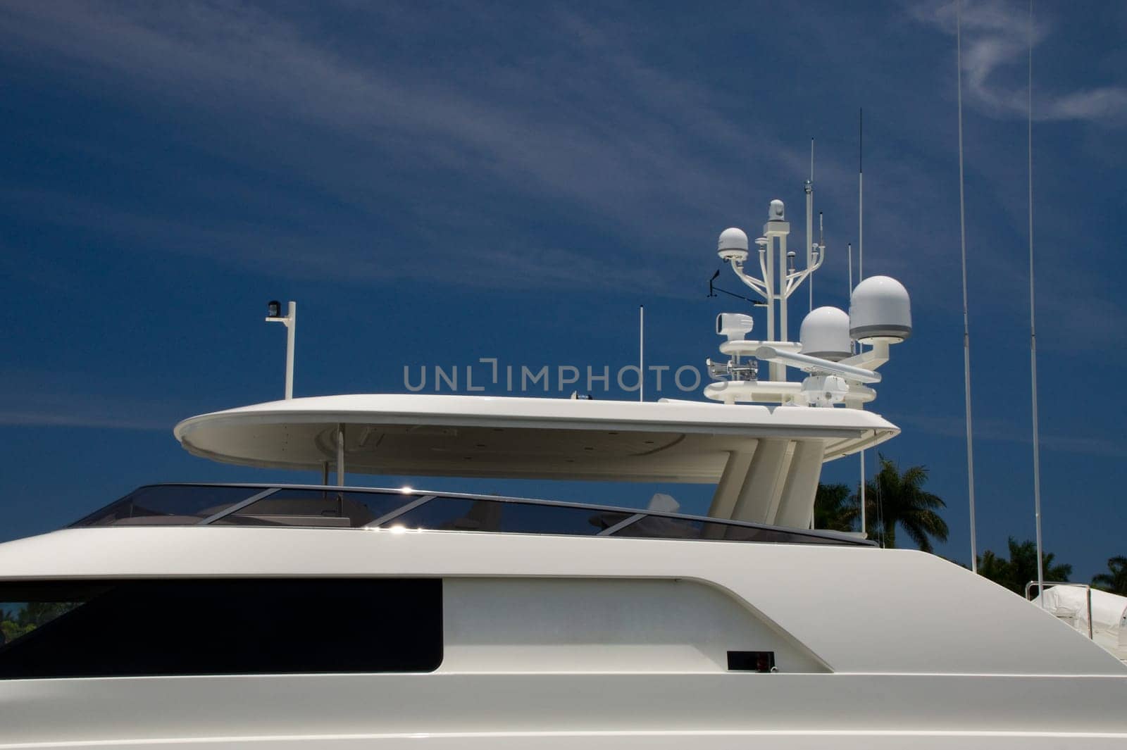 yacht,ship,boat,side,side,close up,close,dense,white,window,antenna,radar,black,protection,sunscreen,sky,blue