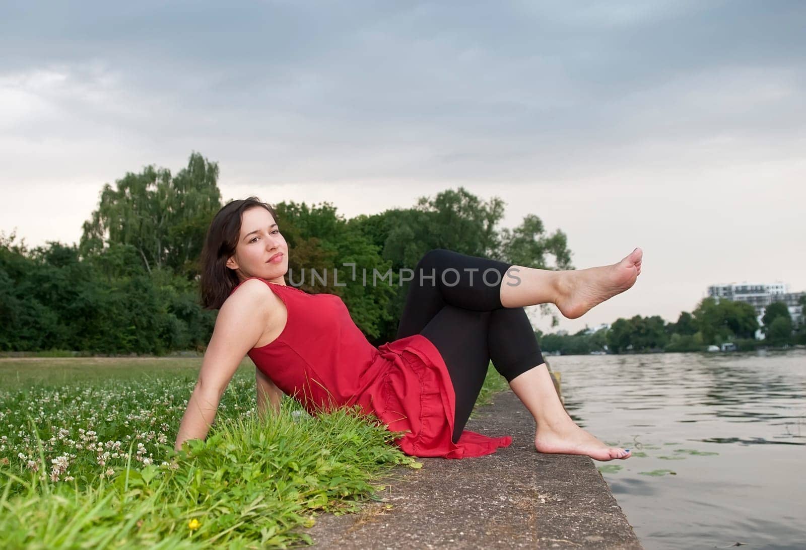 young woman by the river
