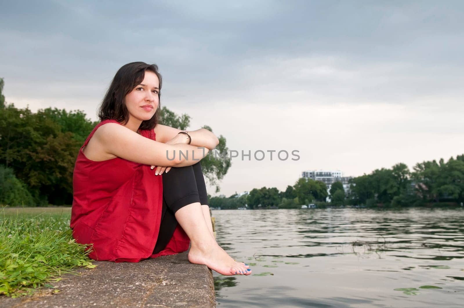 young woman by the river