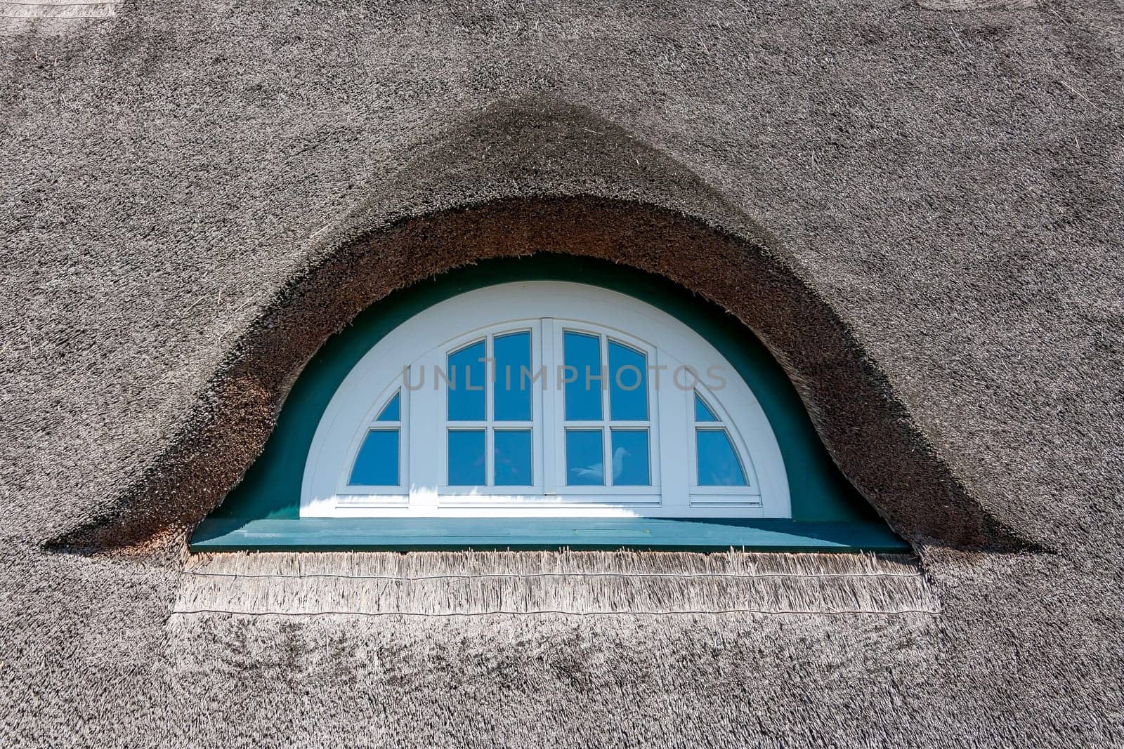 Dormer of a traditional thatched-roof house, baltic sea, germany