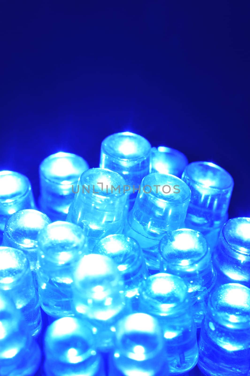 Macrodetail of some blue LEDs in colored light