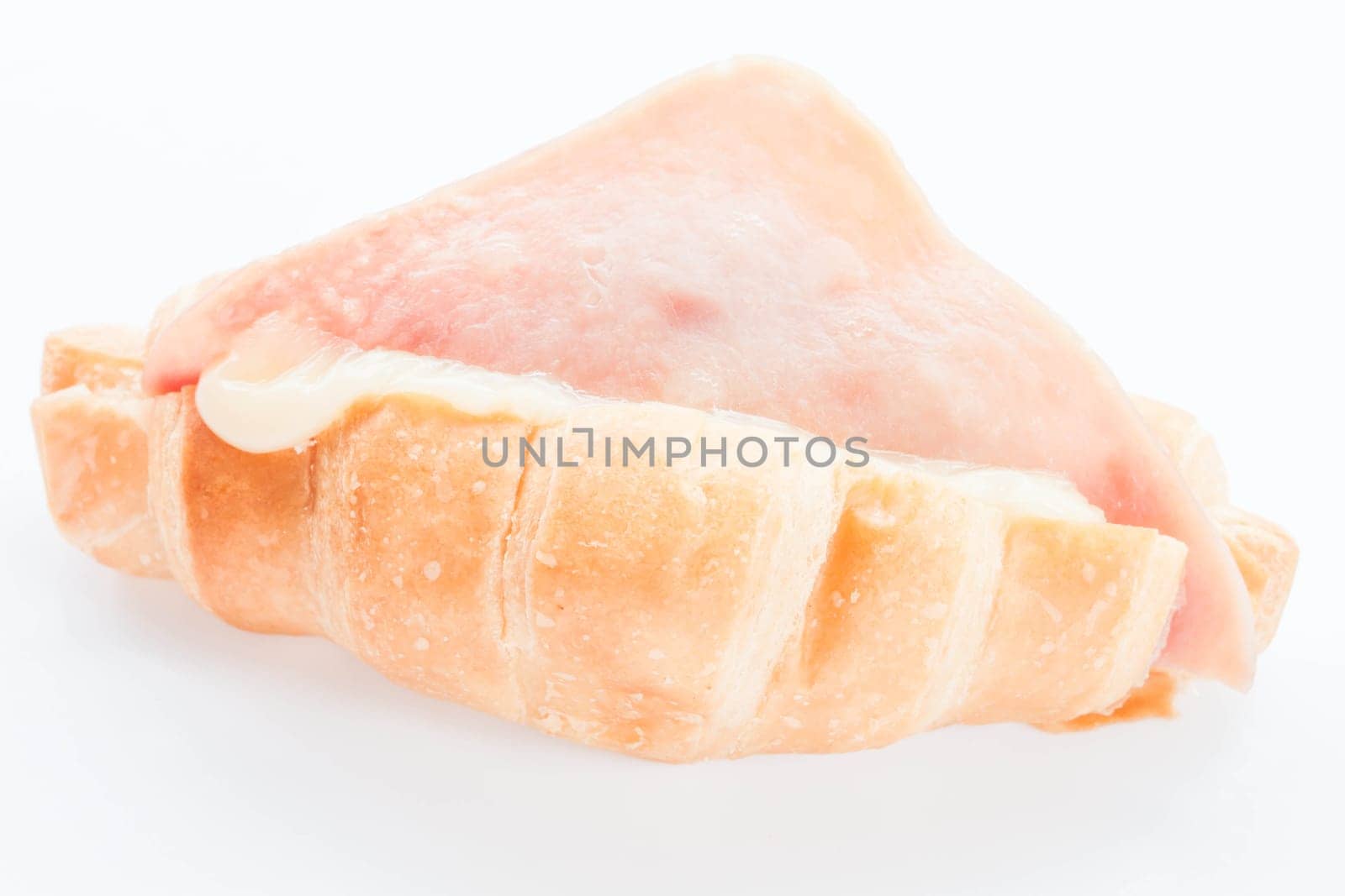 Close up ham cheese croissant isolated on white background