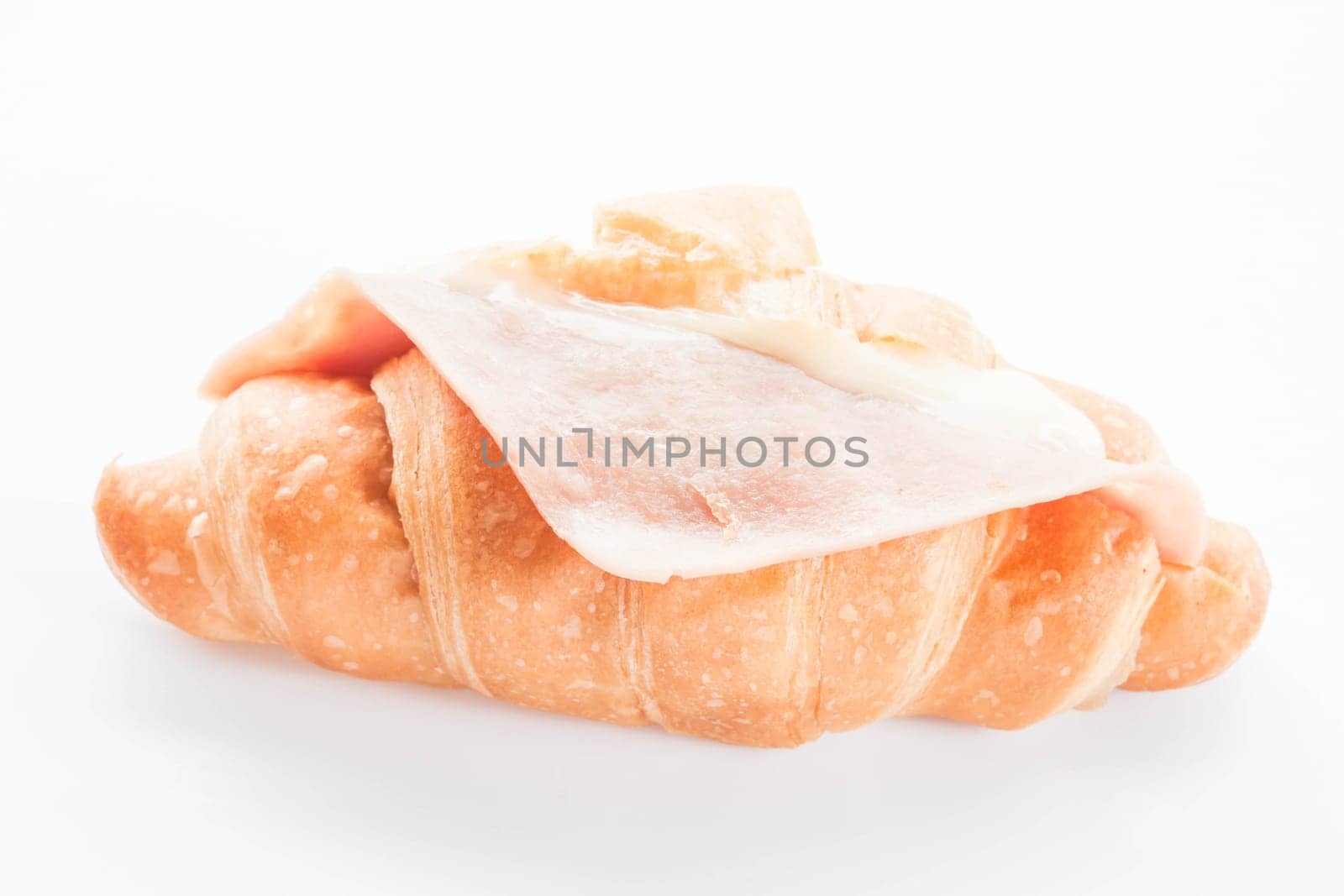 Ham cheese croissant isolated on white background