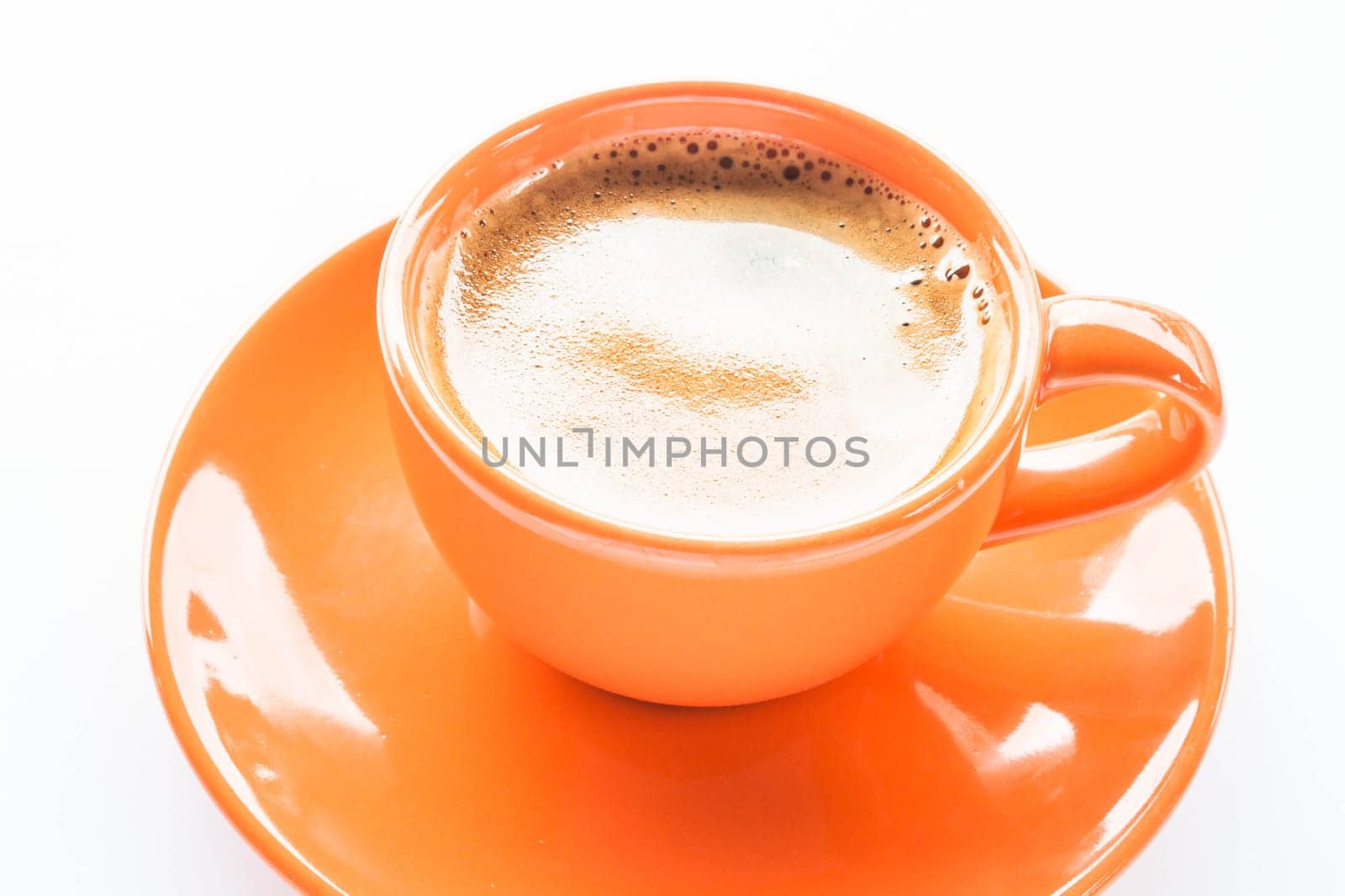 Double shots of espresso in cup isolated on white background