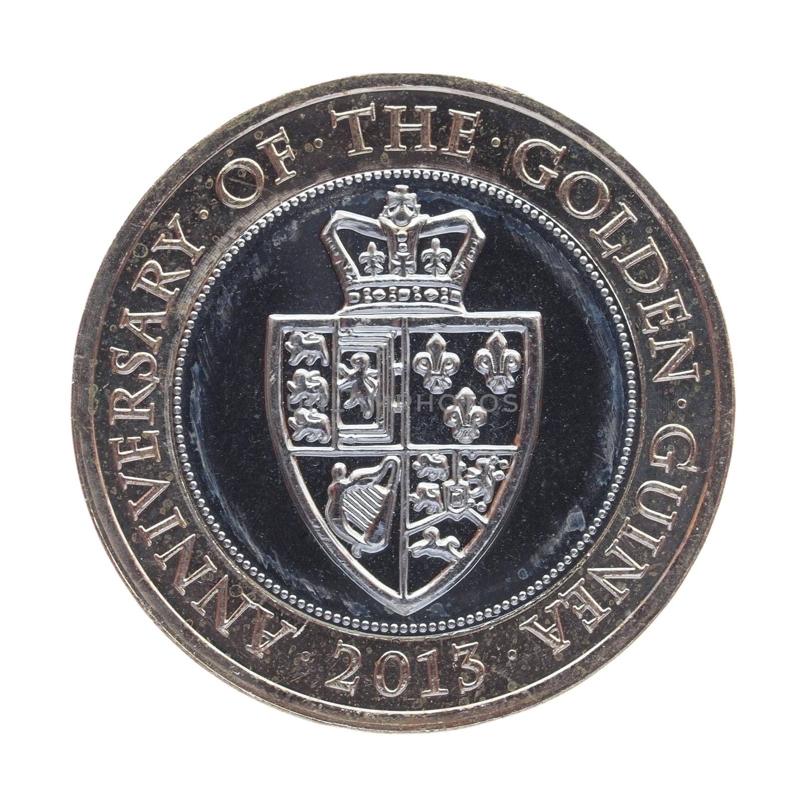 LONDON, UK - JUNE 28, 2014: Celebrative Two British Pound coin for the Anniversary of the Golden Guinea in 2013