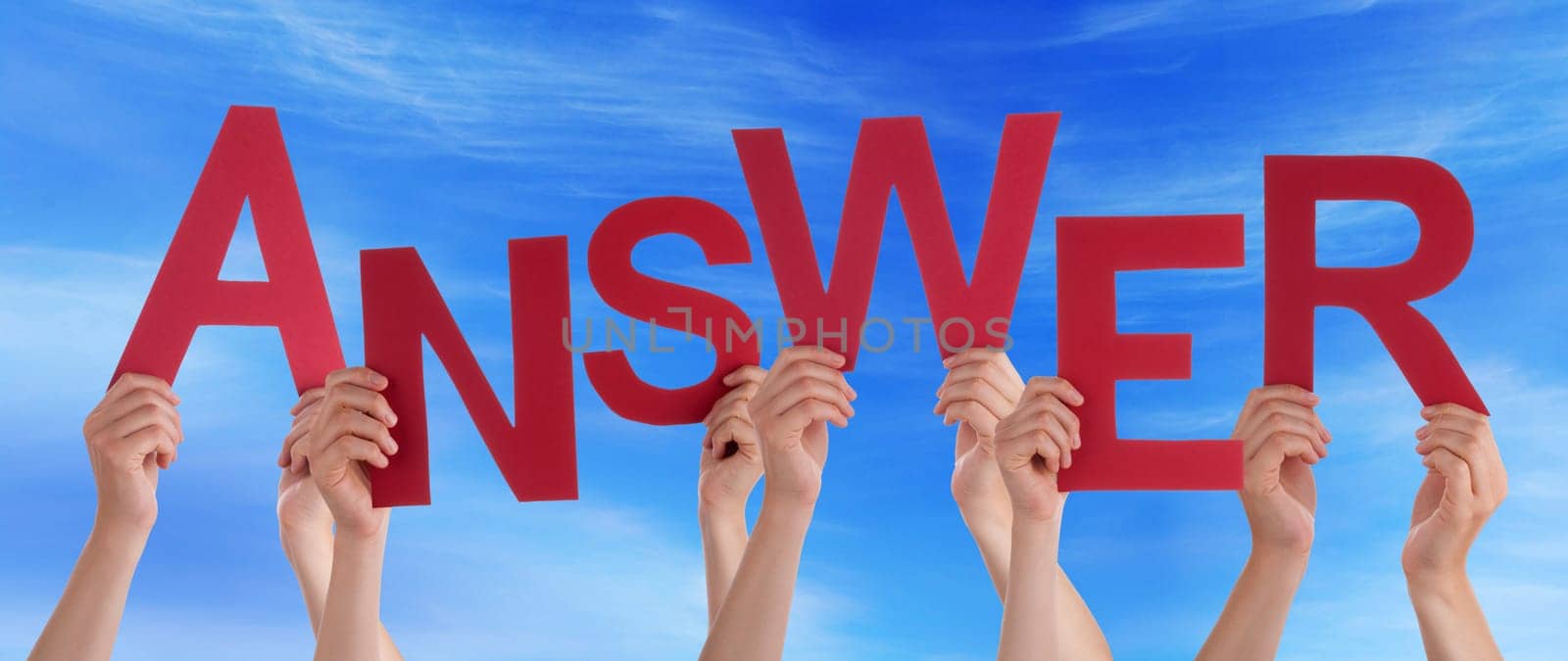 hands holding four pieces of a puzzle with copy space, gray background