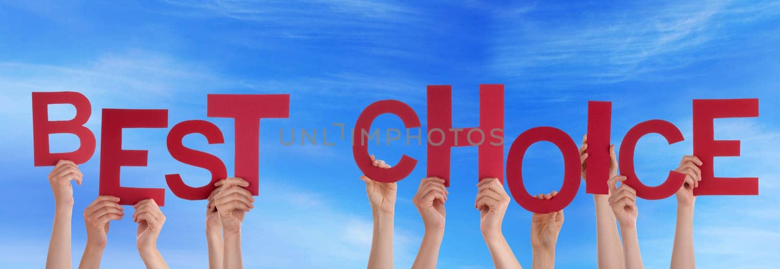 hands holding four pieces of a puzzle with copy space, gray background