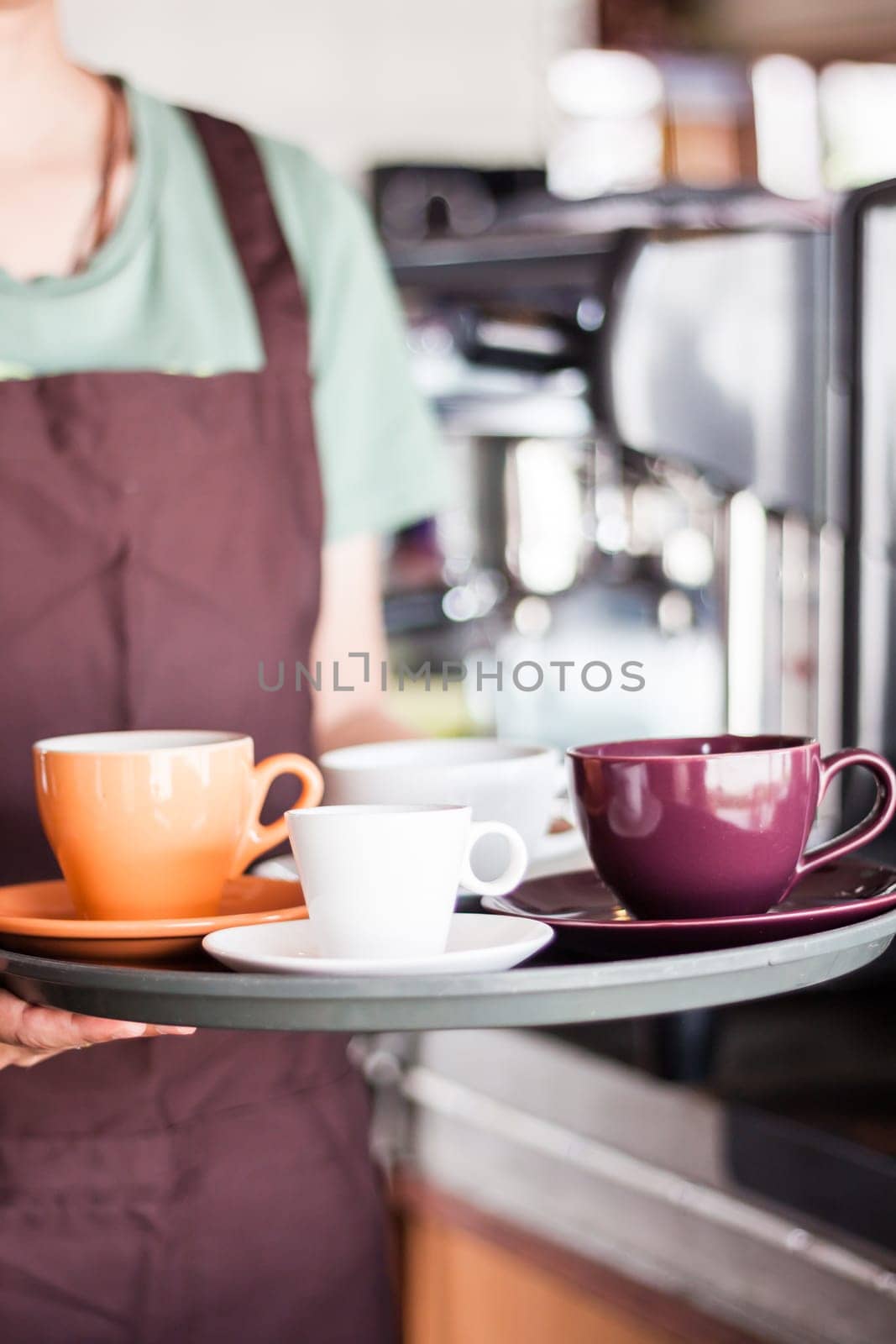 Barista serving set of freshly brewed coffee, stock photo