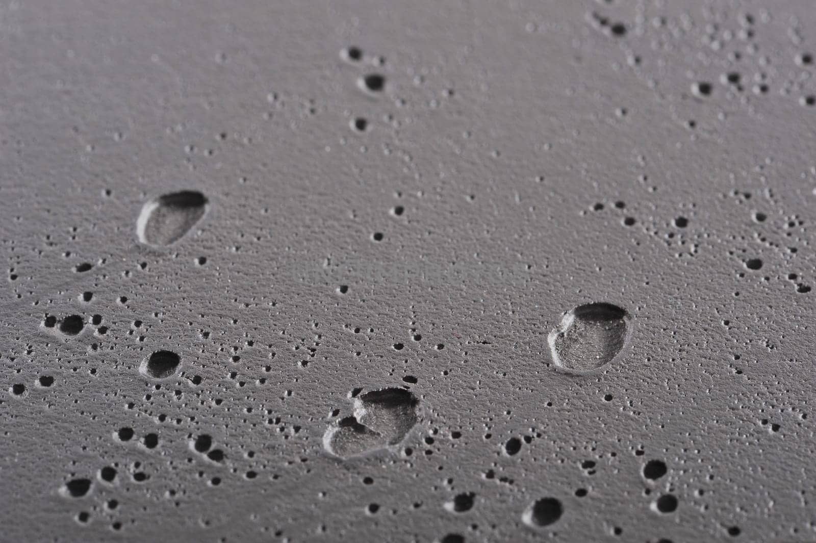 fresh cast dark grey cast concrete background