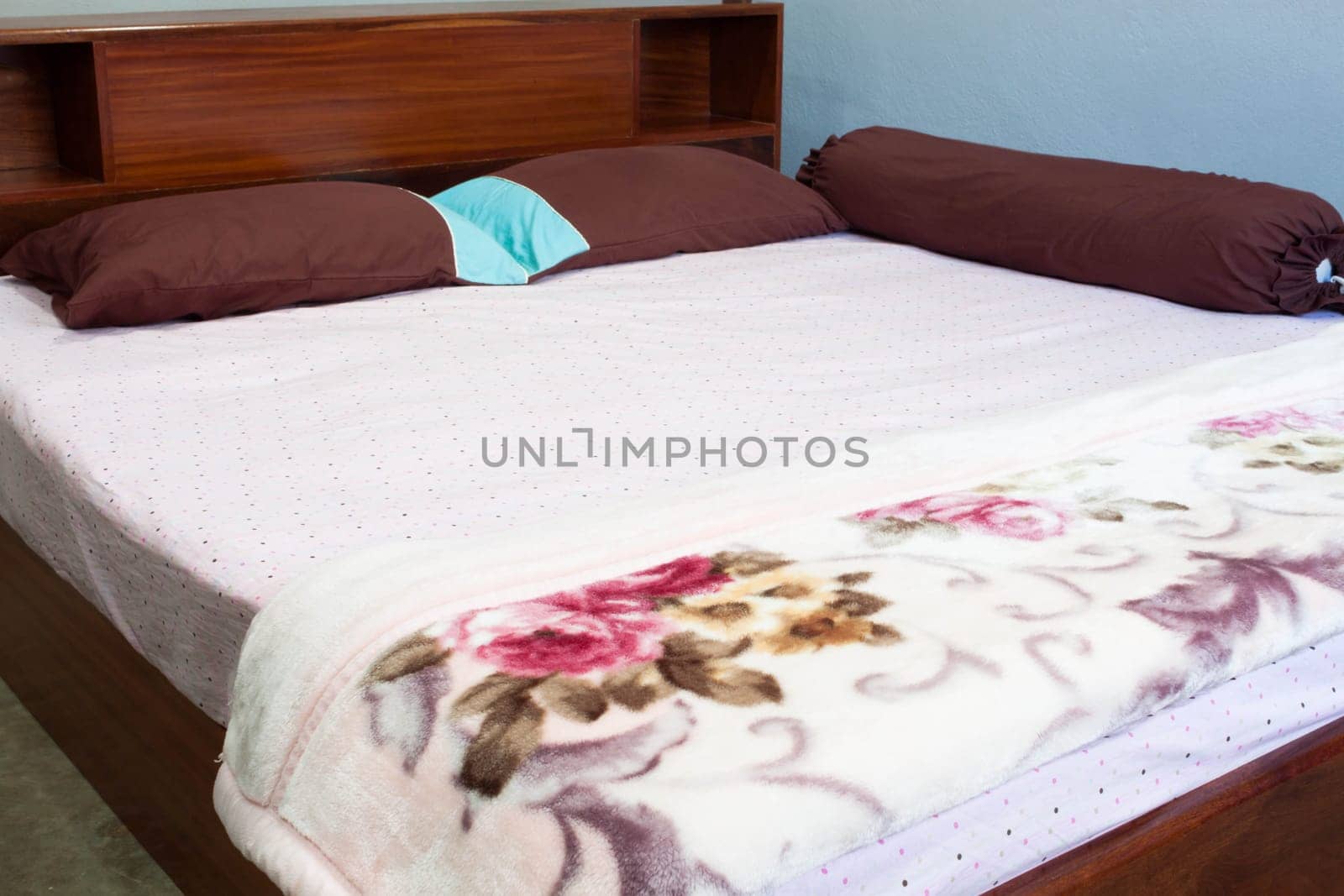 Tranquil bedroom  with a double  hard wood bed