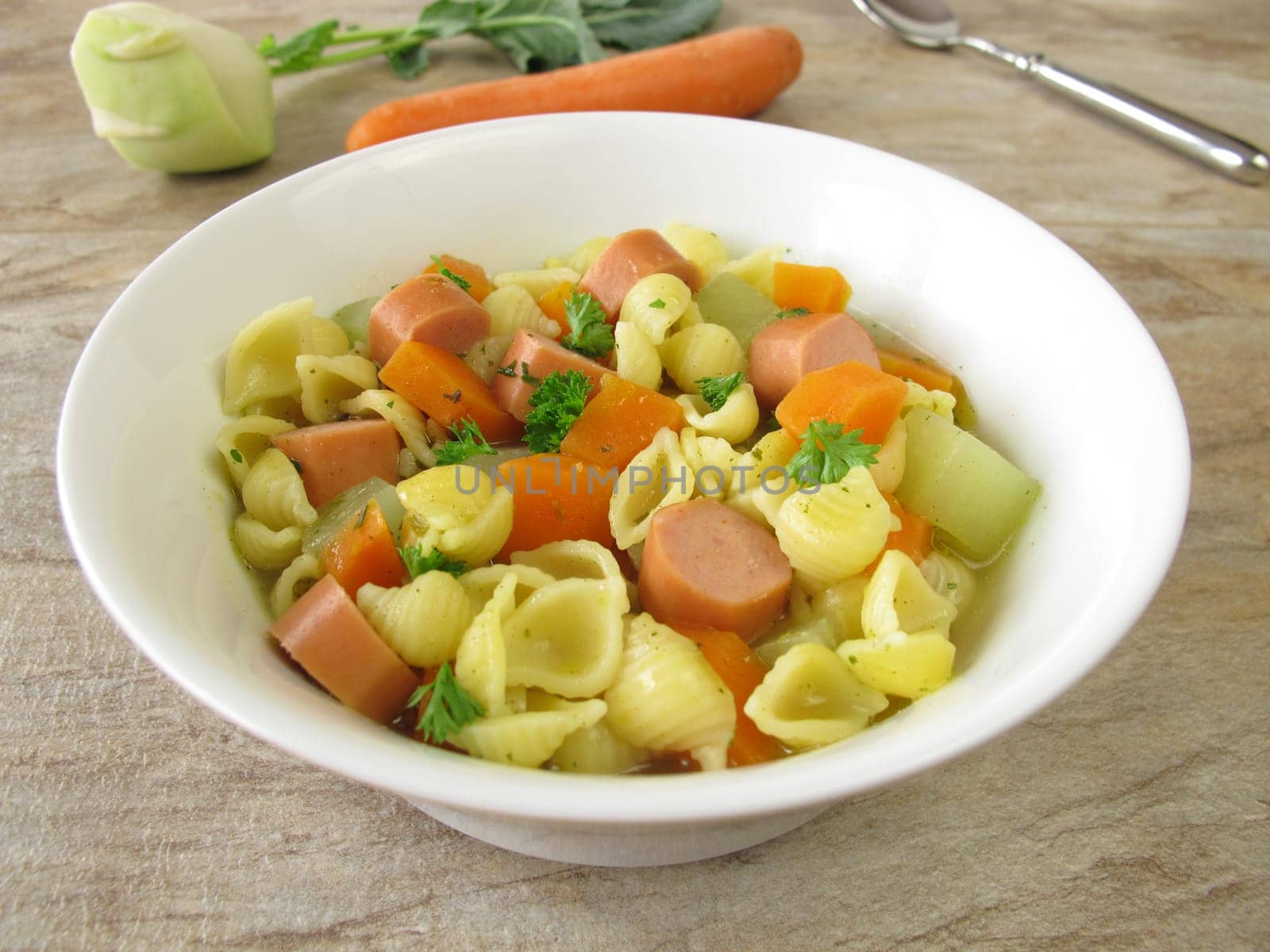 Noodle soup with sausages