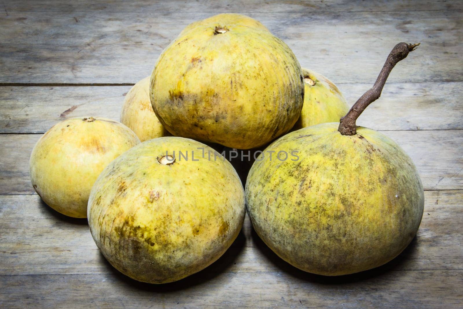 Santol fruit  on wood background