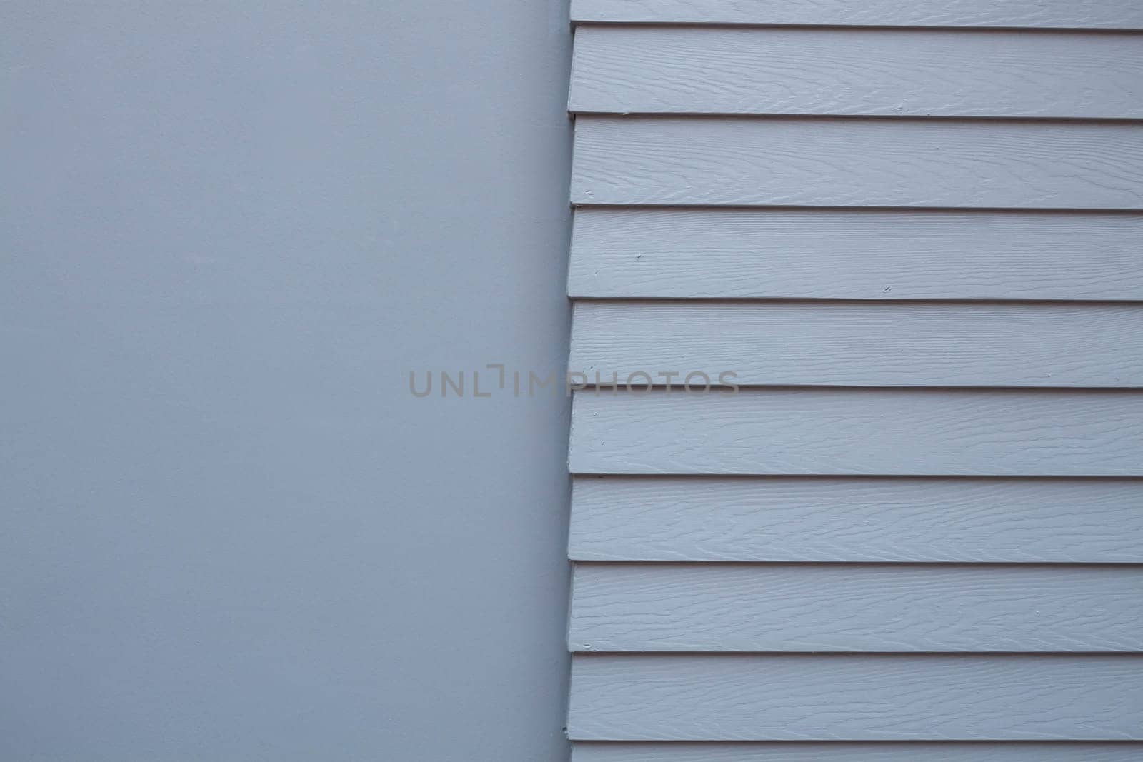 Vintage gray cement wall with half smooth and step texture