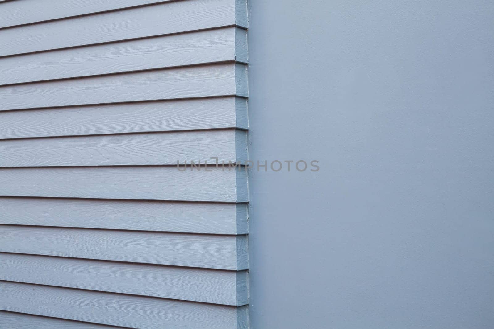 Vintage gray cement wall with half smooth and step background