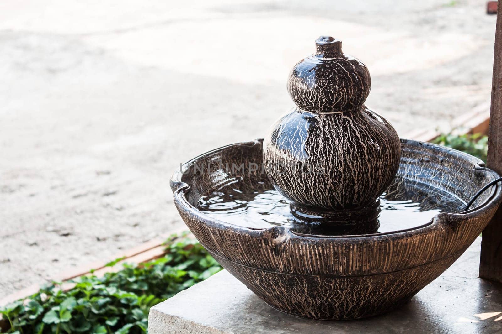 Jar fountain decorated home  garden