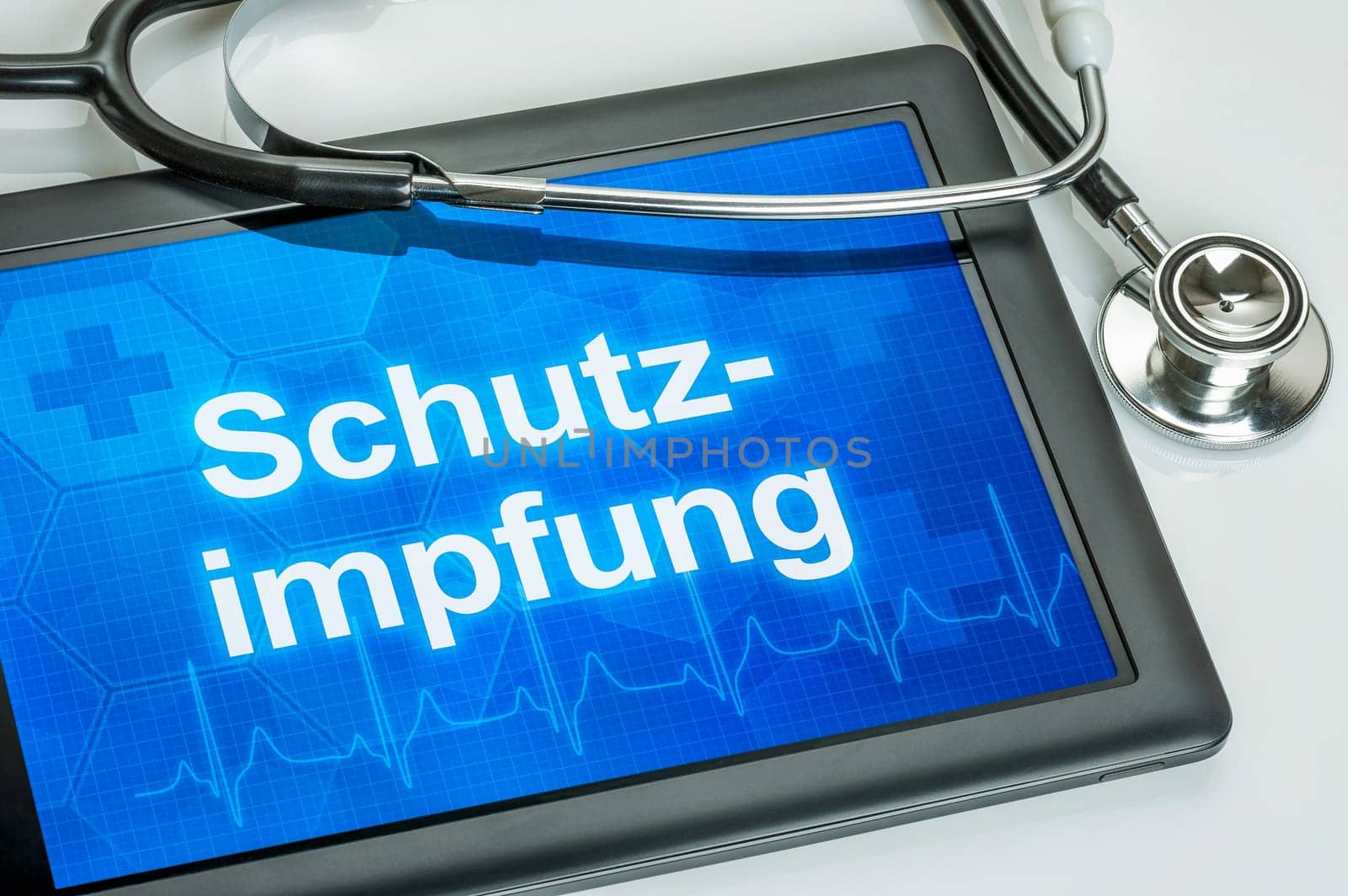 Tablet with the text vaccination on the display