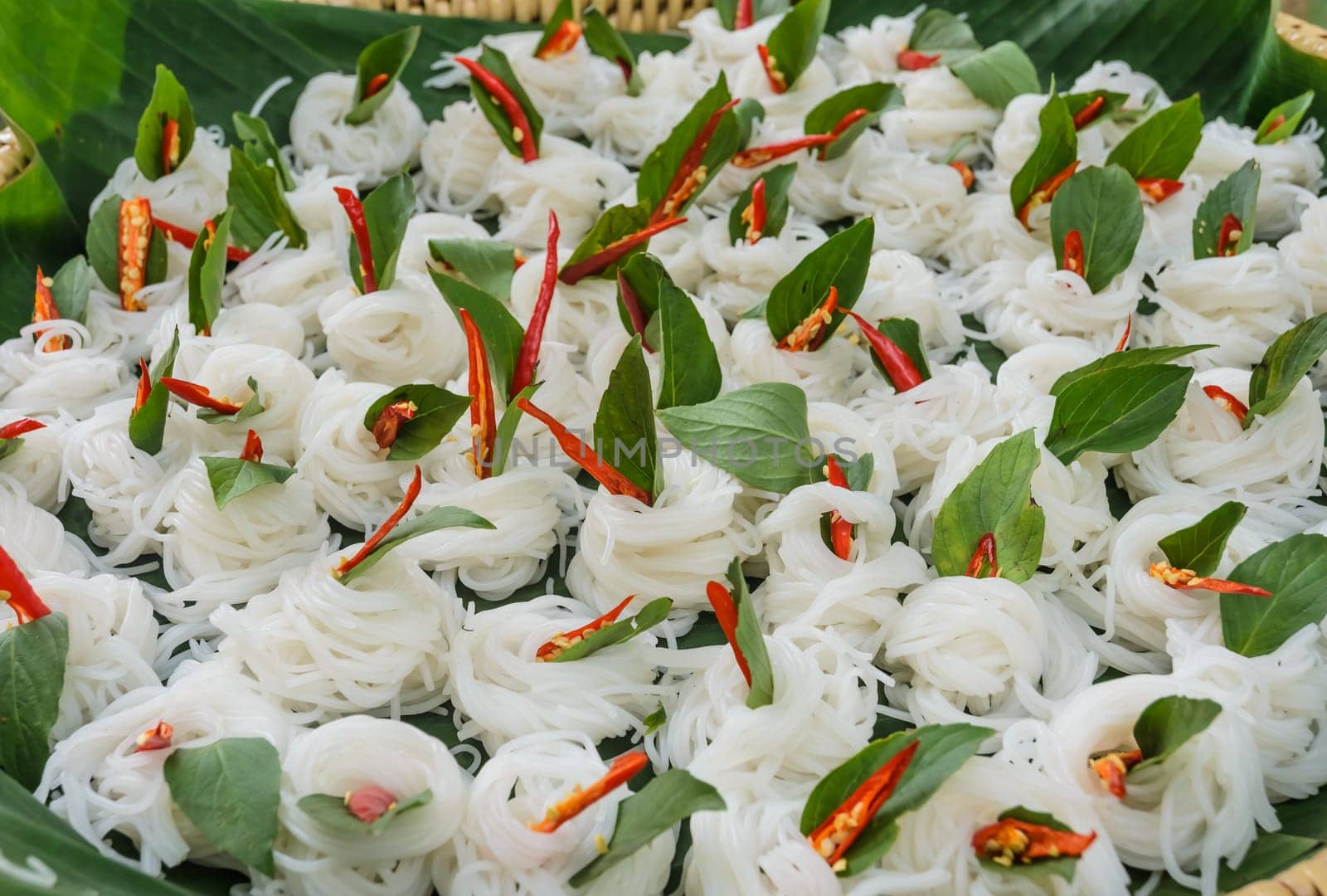 Thai rice noodle (Khanom chin) with chili and Thai basil
