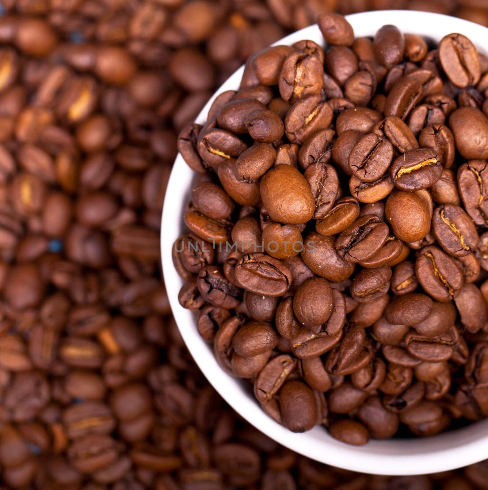 Coffee beans in a cup