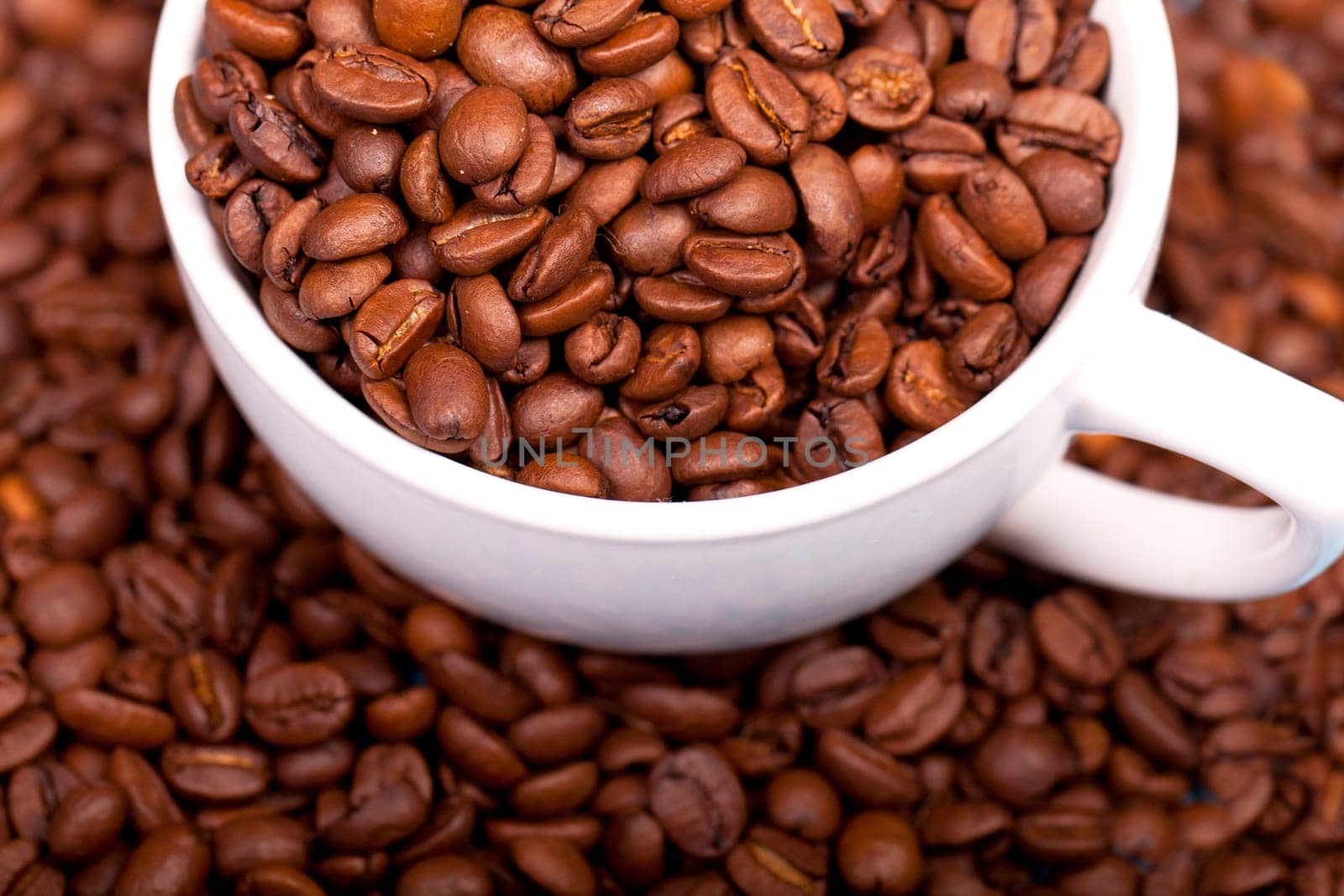 Coffee beans in a cup