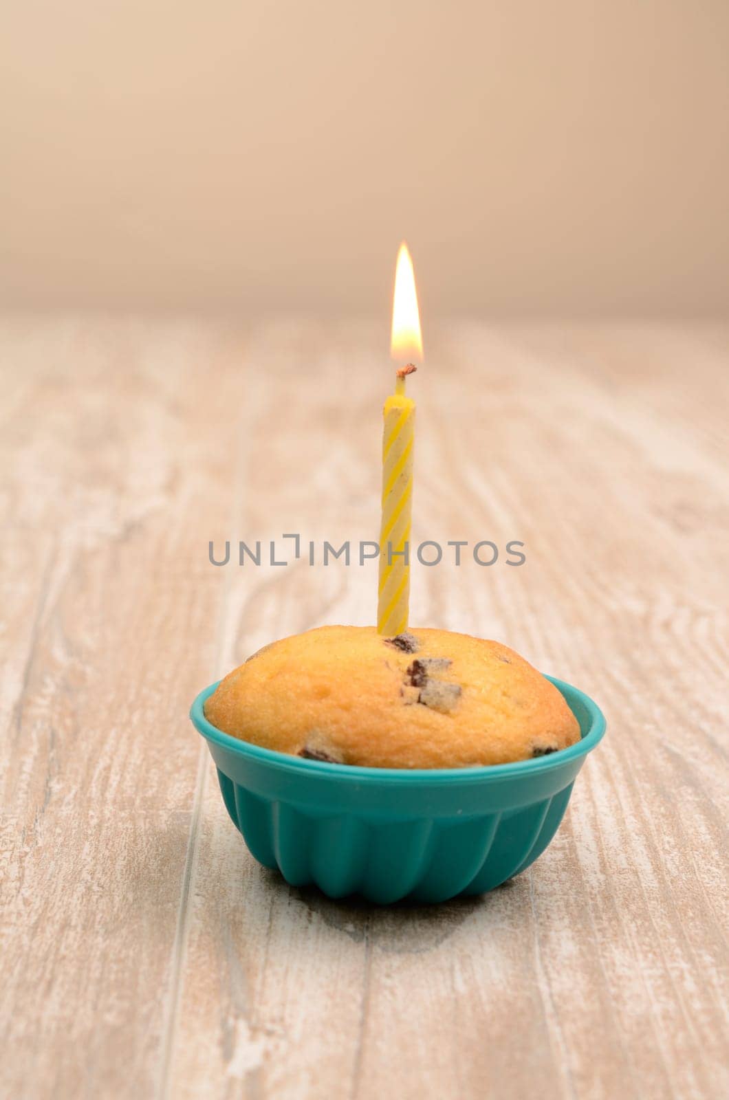 Birthday cake with one candle light