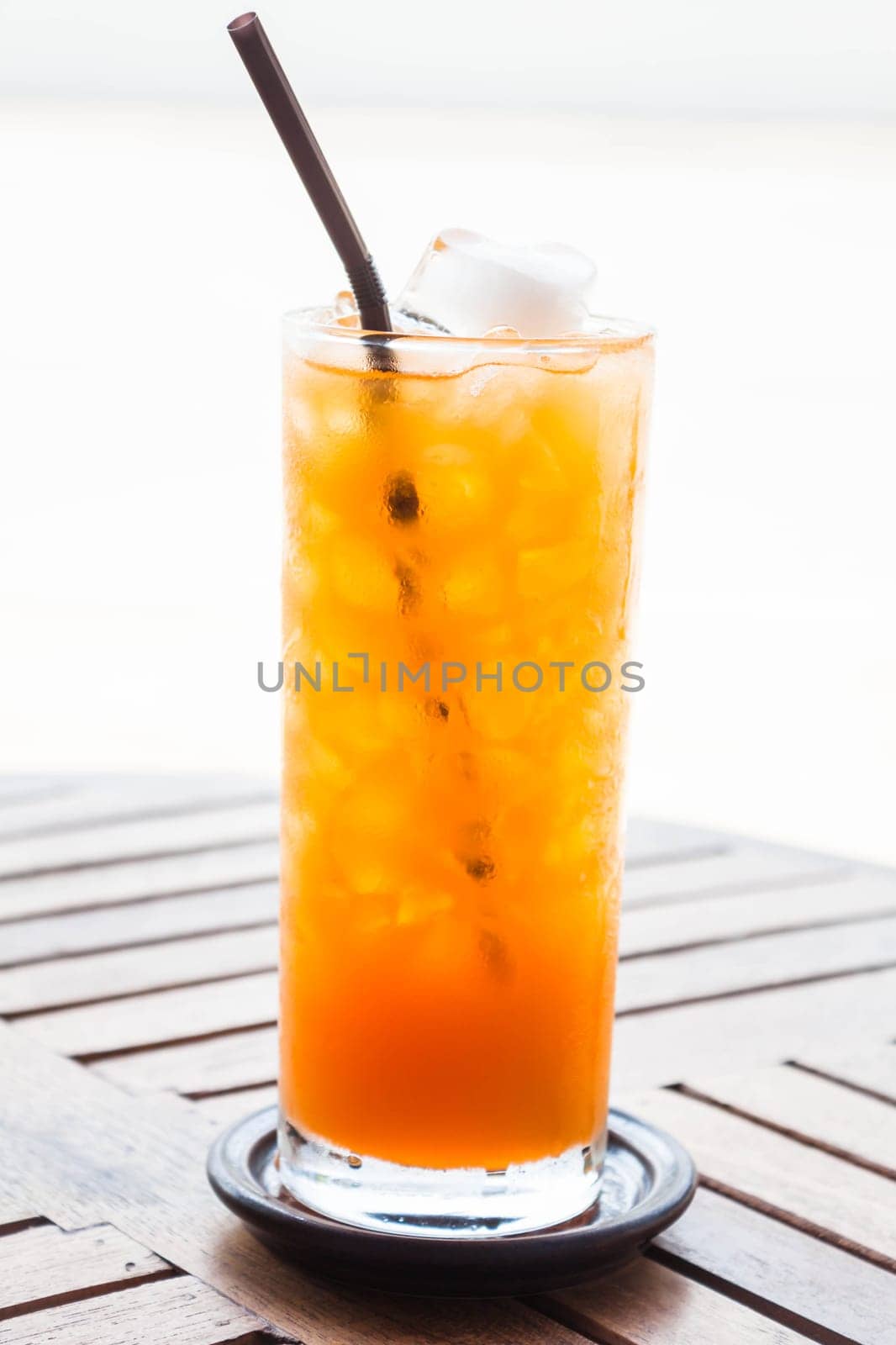 Full glass of fresh iced orange juice