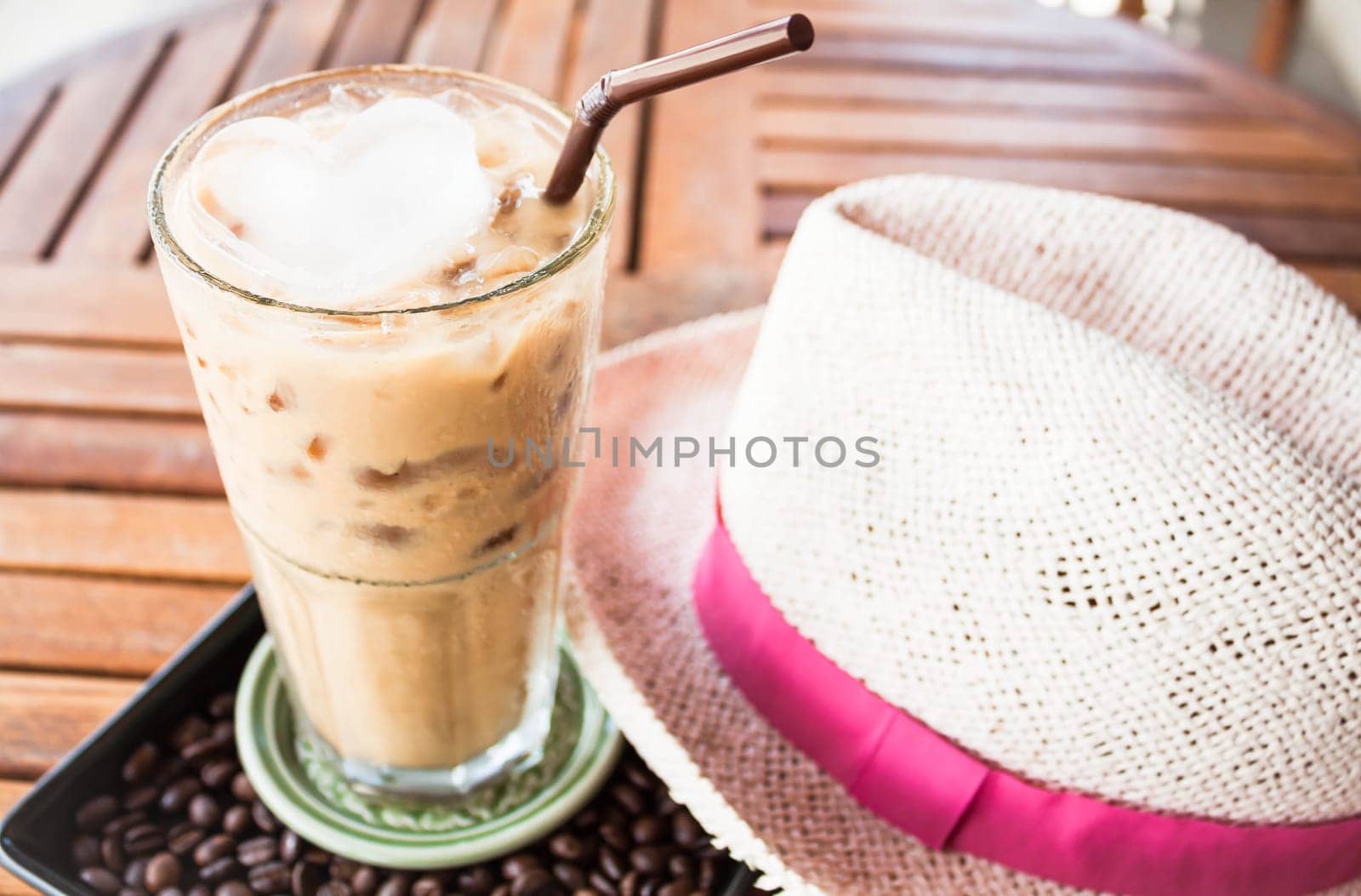 Coffee break with iced espresso at coffee shop