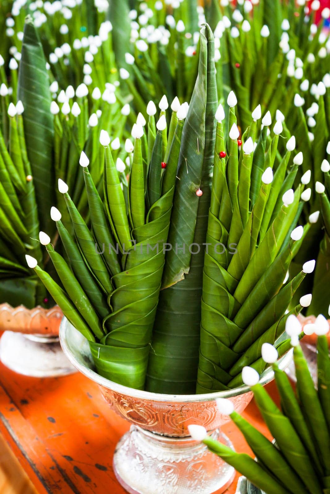 Handicraft banana leaf rice offering in metal tray