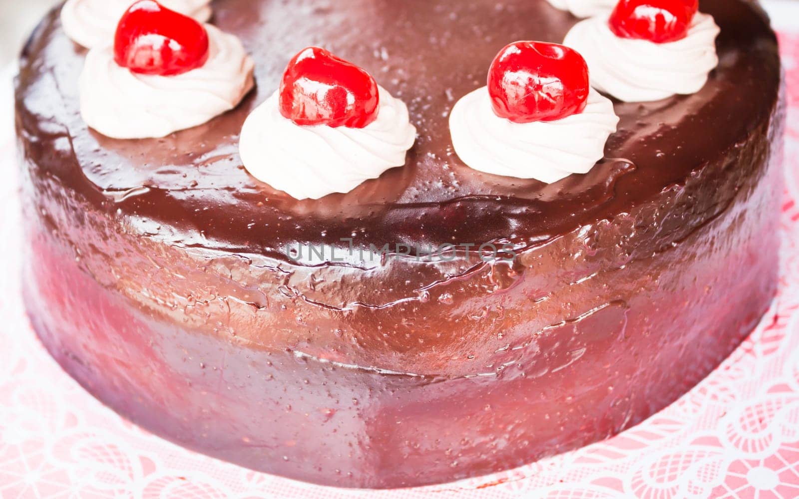 Fresh bake chocolate cake with cherry and whipped cream