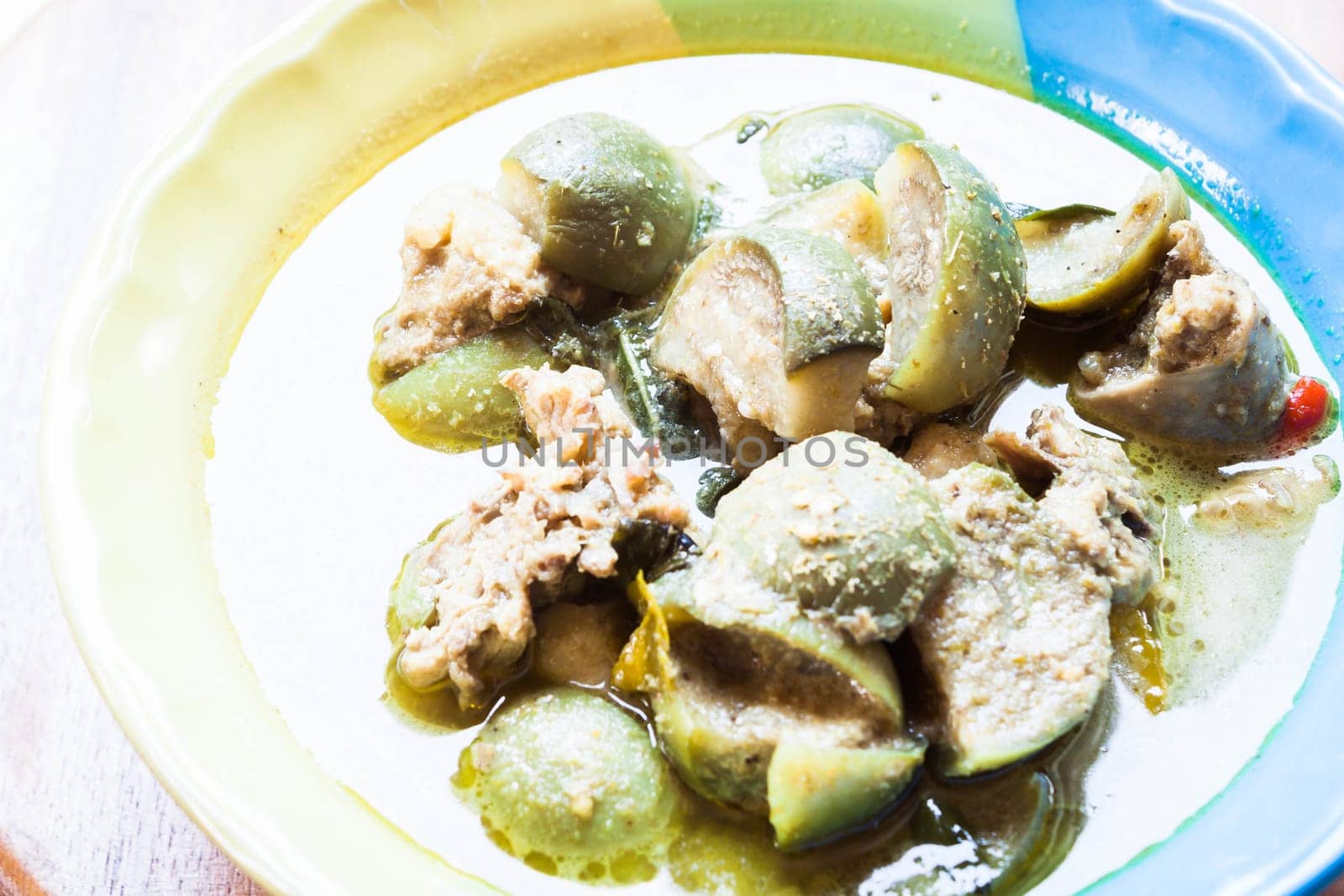 Top view of spicy green curry, thai traditional food