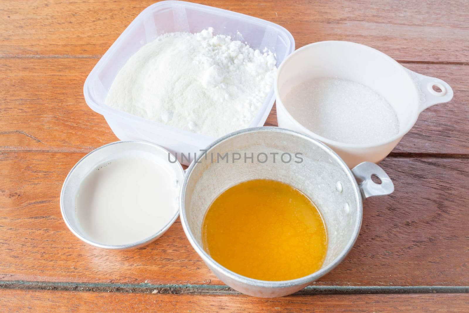 Set of baking ingredients flour, butter, sugar and milk