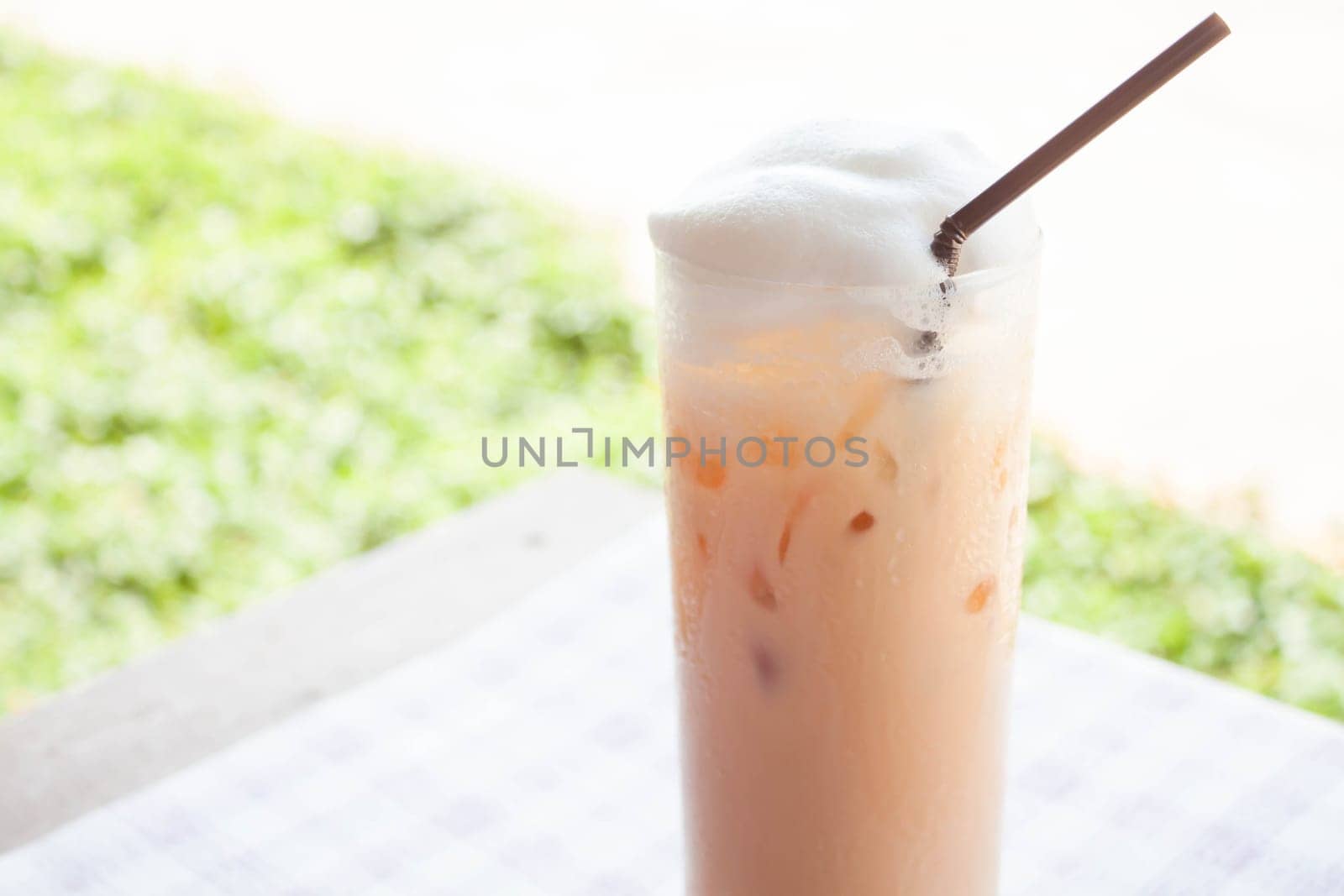 Fresh glass of iced thai milk tea