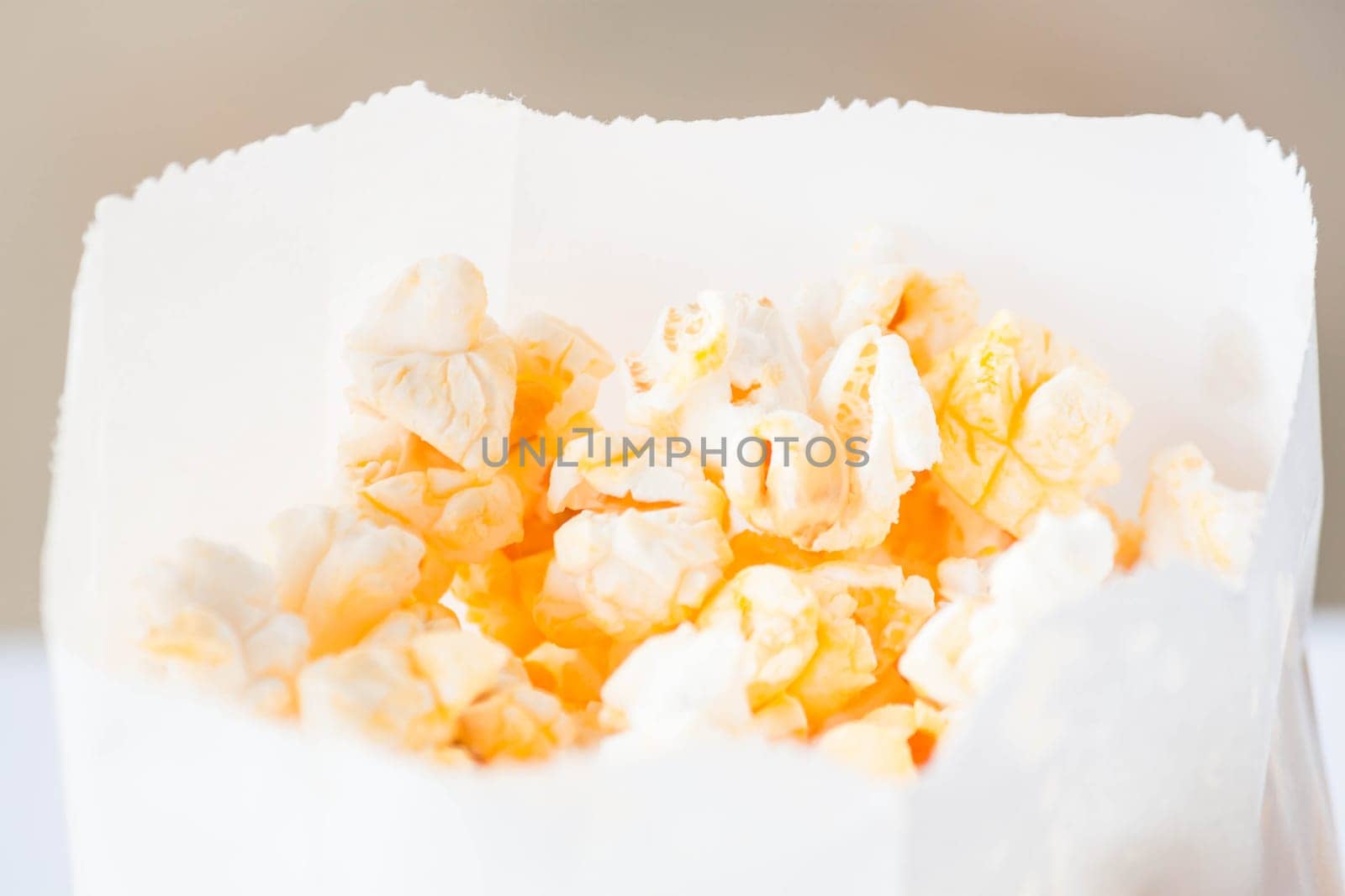 Fresh classic butter popcorn in paper pack