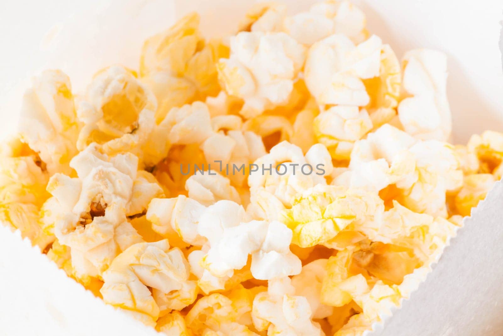 Full bag of butter popcorn up close