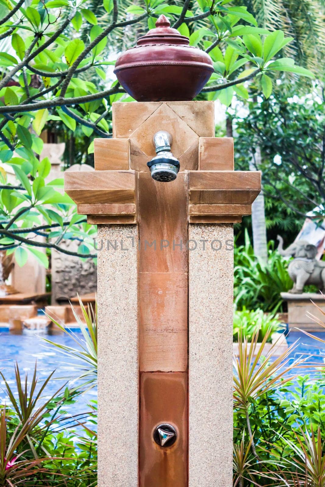 Beautiful outdoor shower area for swimming pool
