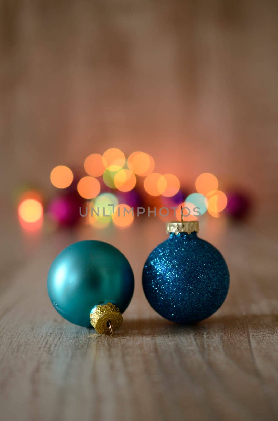 Christmas baubles on a rustic wooden background