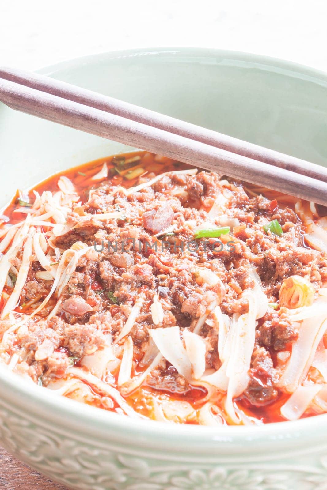 Close up spicy noodle in meat soup