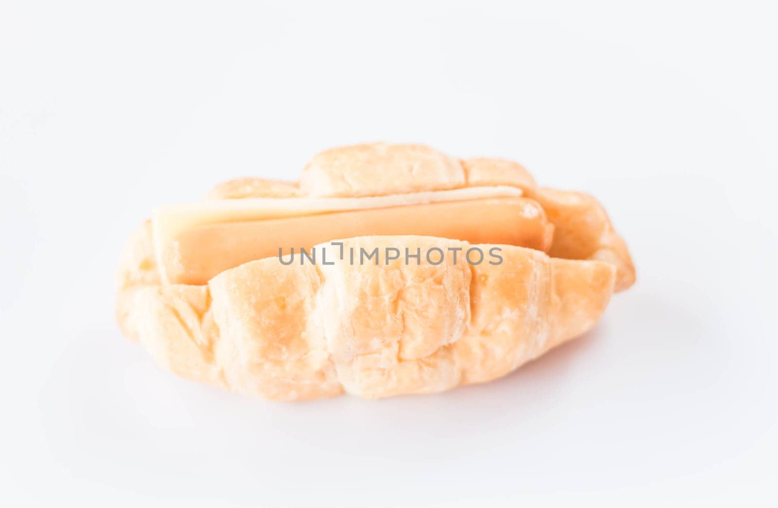 Sausage and cheese croissant isolated on white background