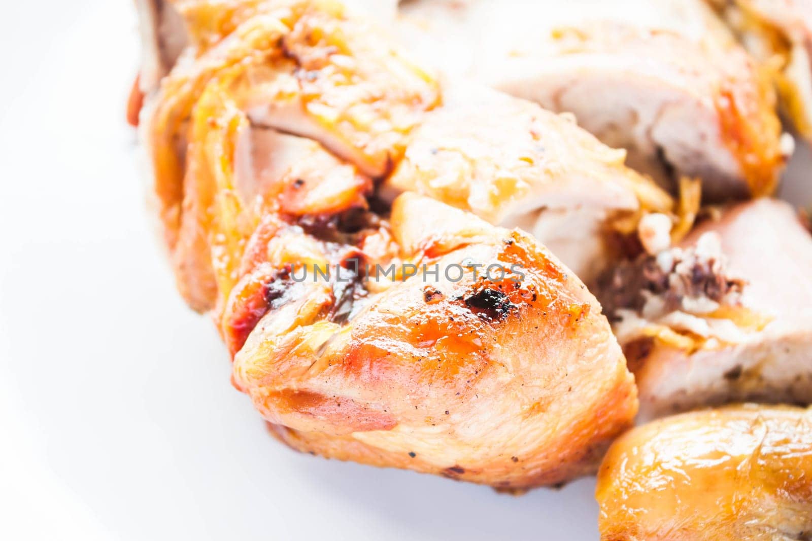 Chicken grilled serving on white dish, stock photo
