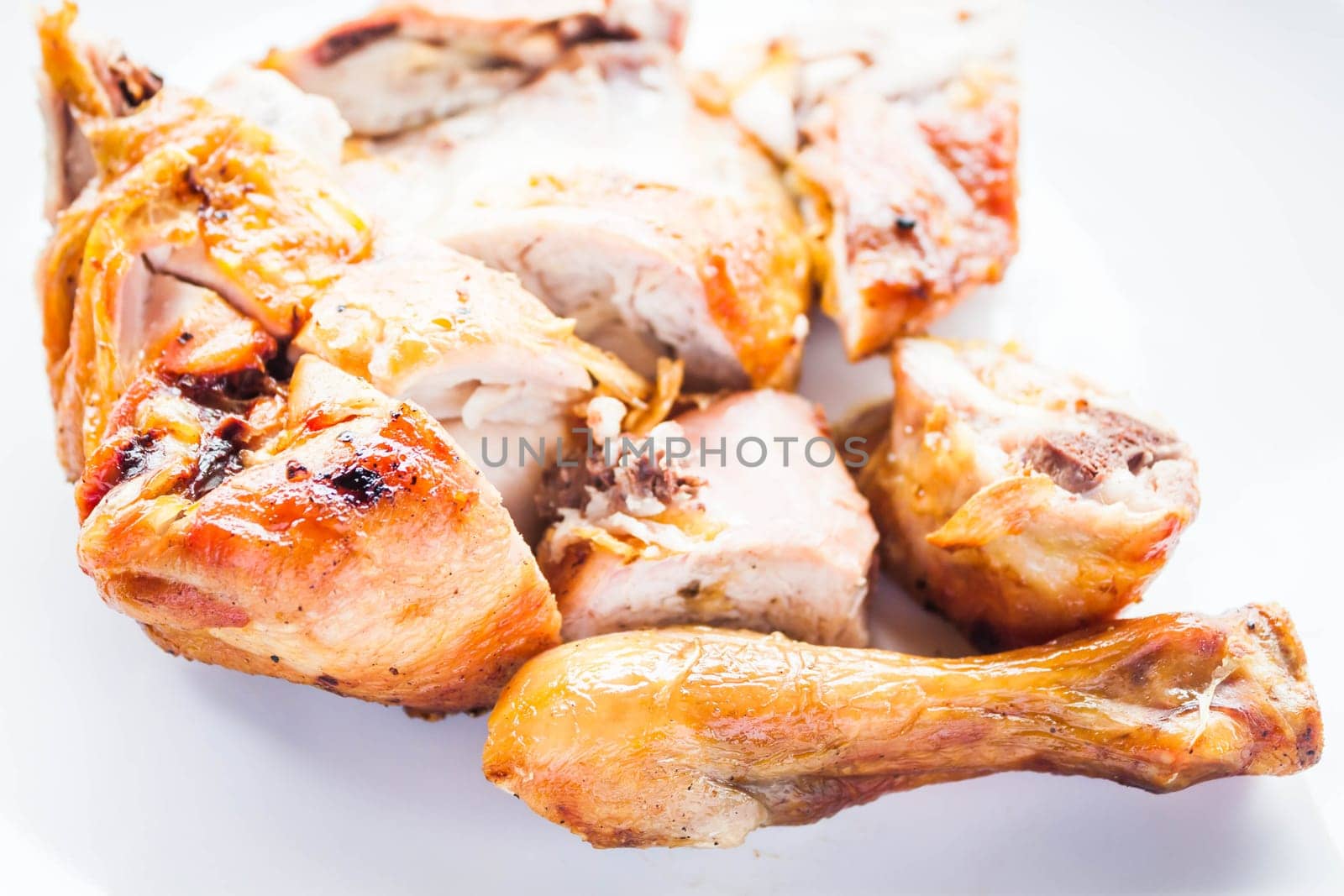 Chicken grilled serving on white plate, stock photo